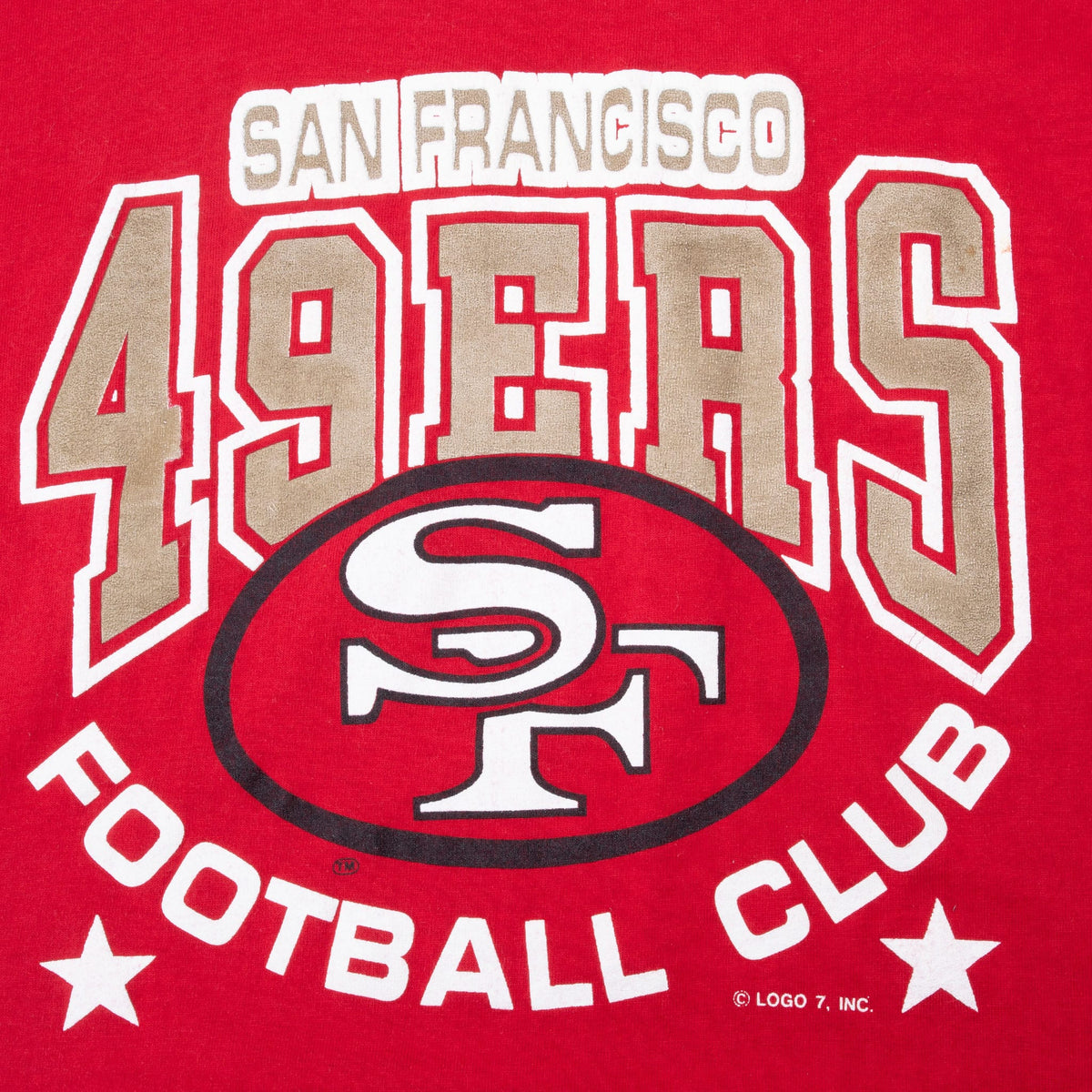 Close-up of San Francisco 49ers Football Club front graphic with SF oval logo and stars