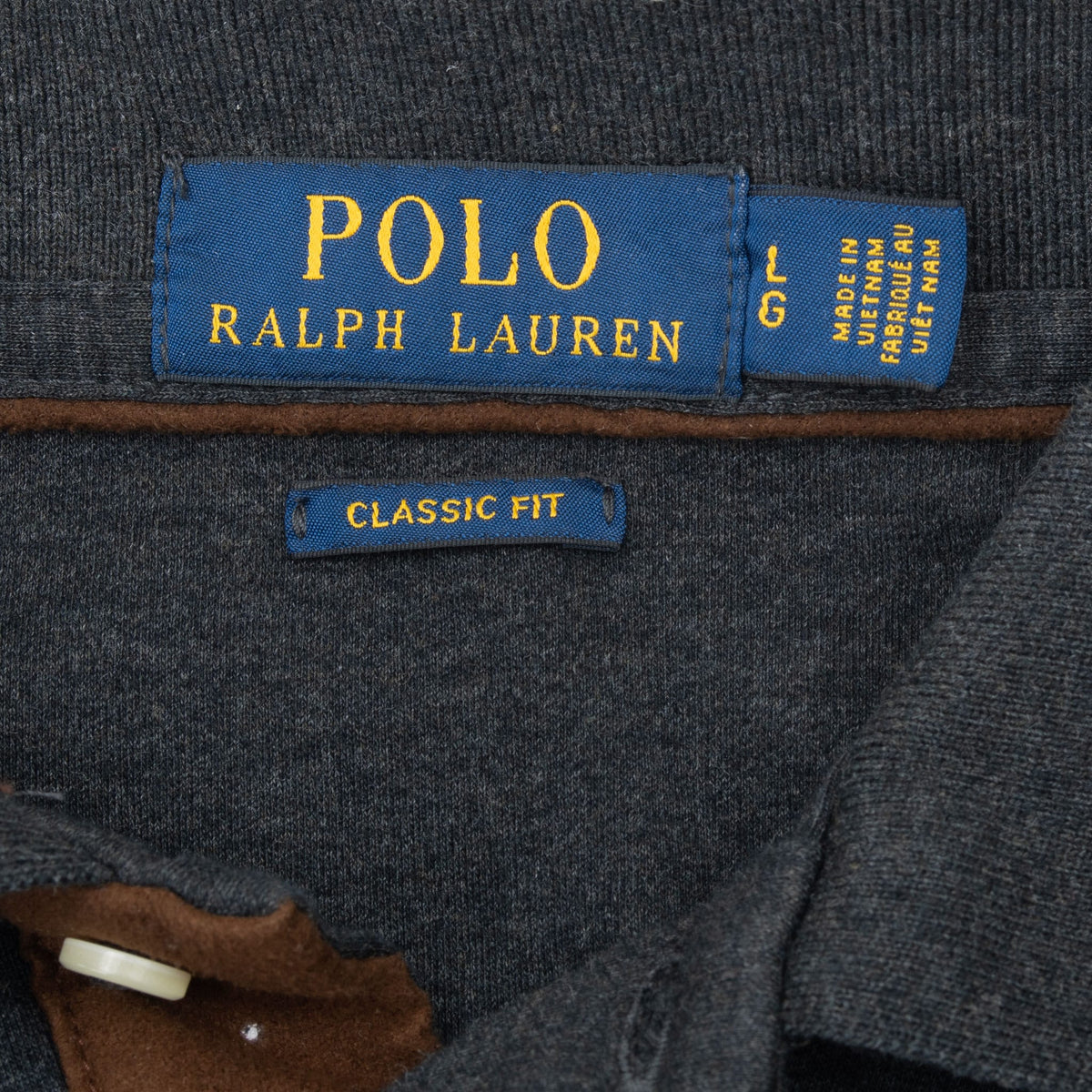 Ralph Lauren Classic Fit neck label with size Large tag and brown placket trim