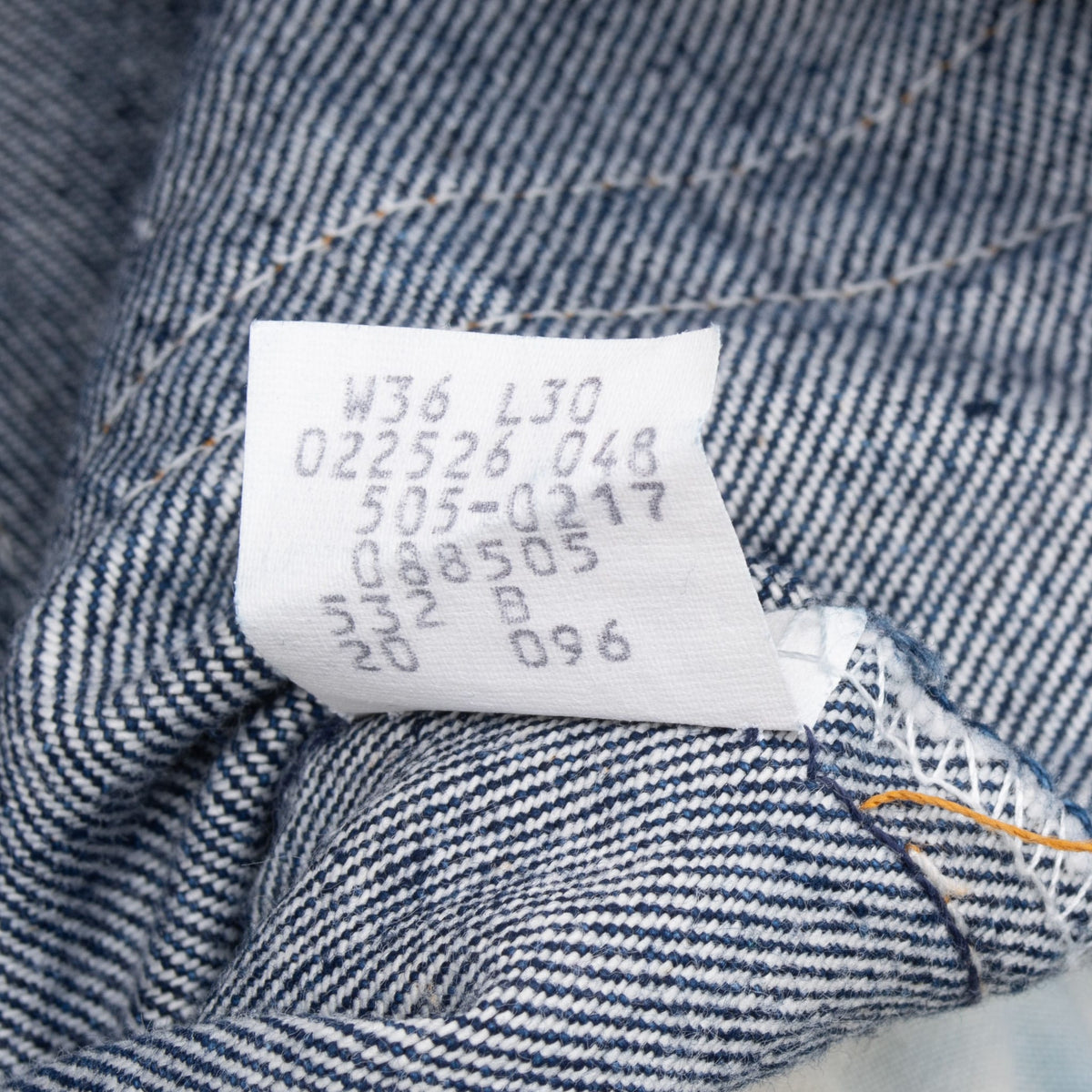 Close-up of the interior Levi's 505 jeans tag marked W36 L30 and 505-0217