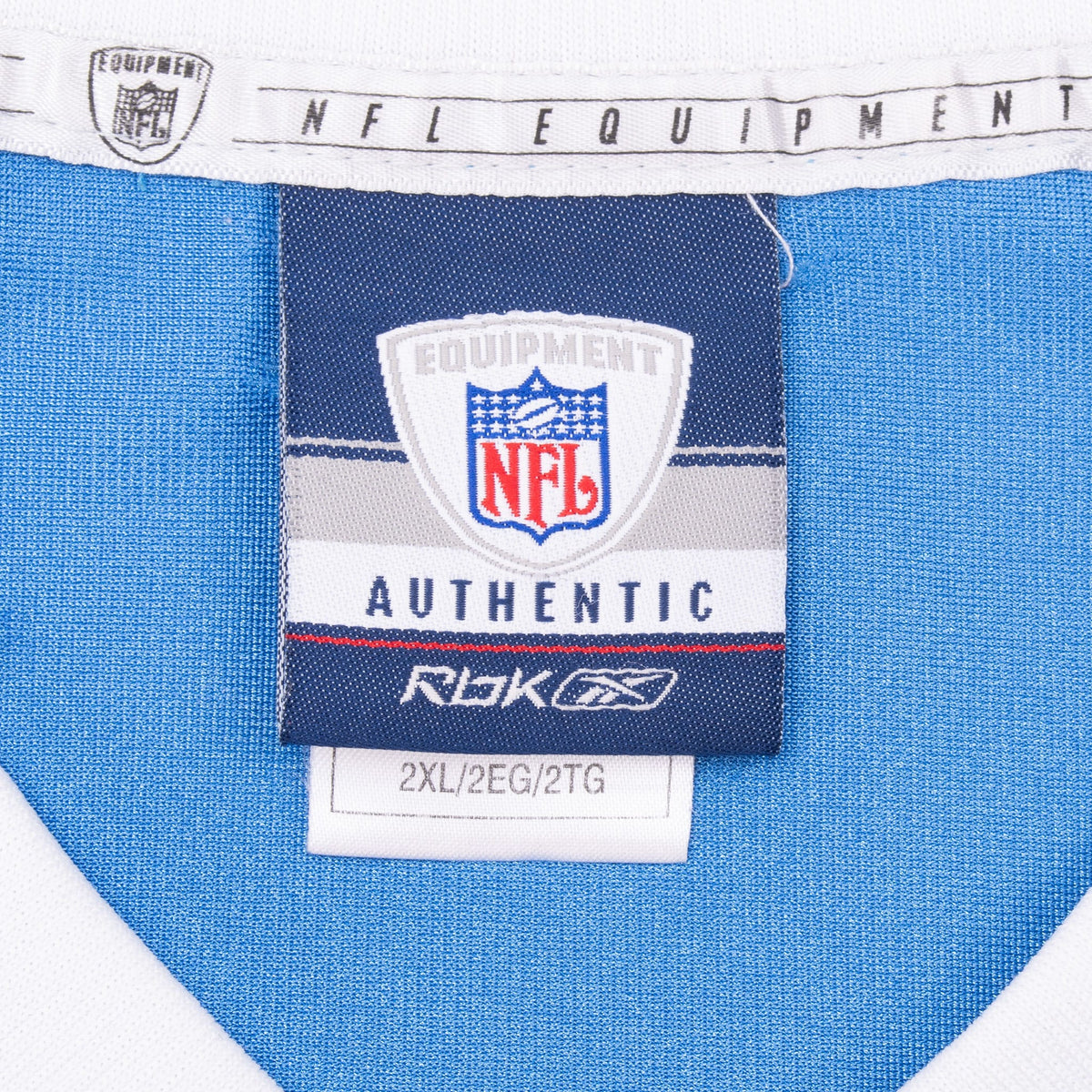 Reebok NFL Equipment neck tag and size 2XL label inside powder blue jersey