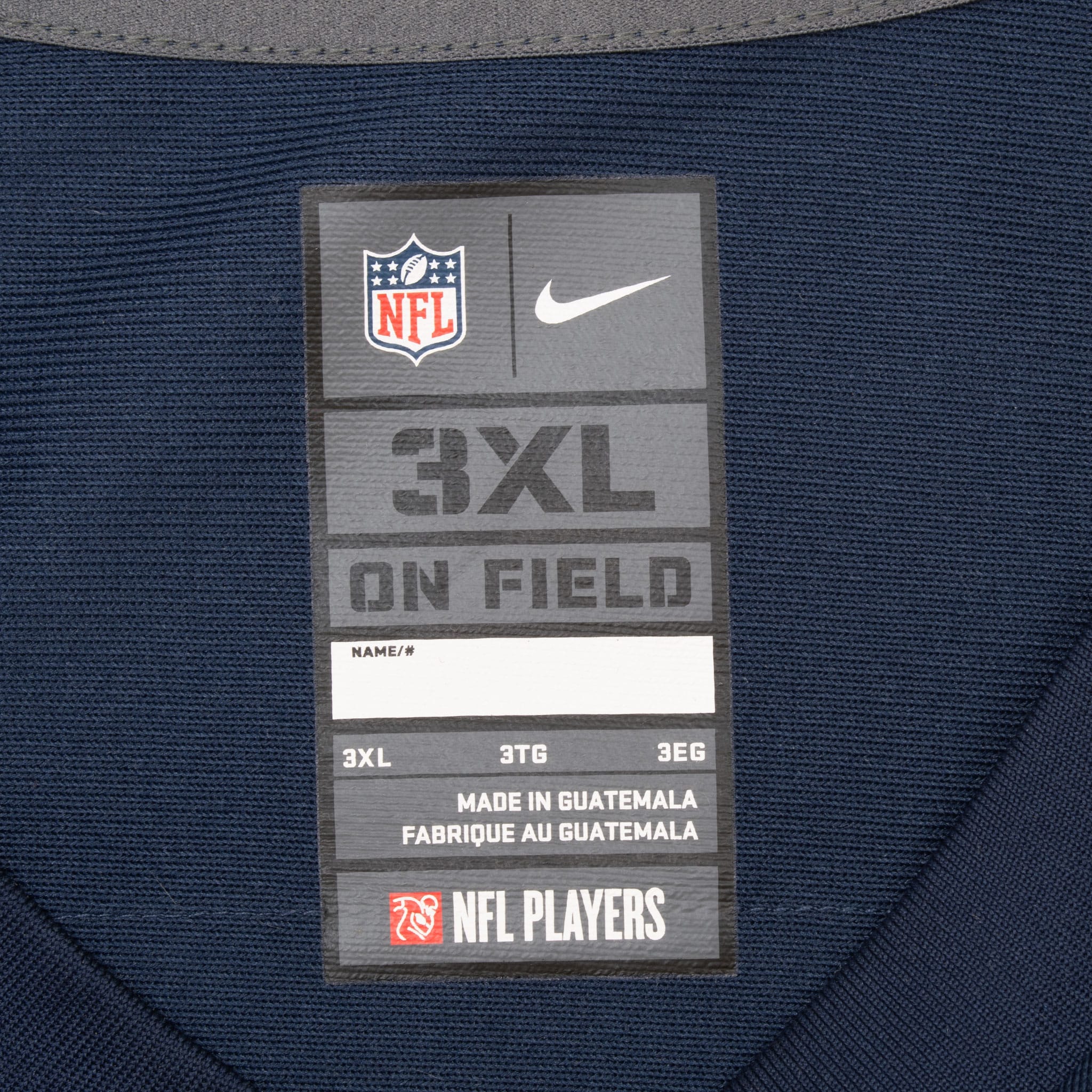 Inside neck label showing Nike NFL On Field and size 3XL branding
