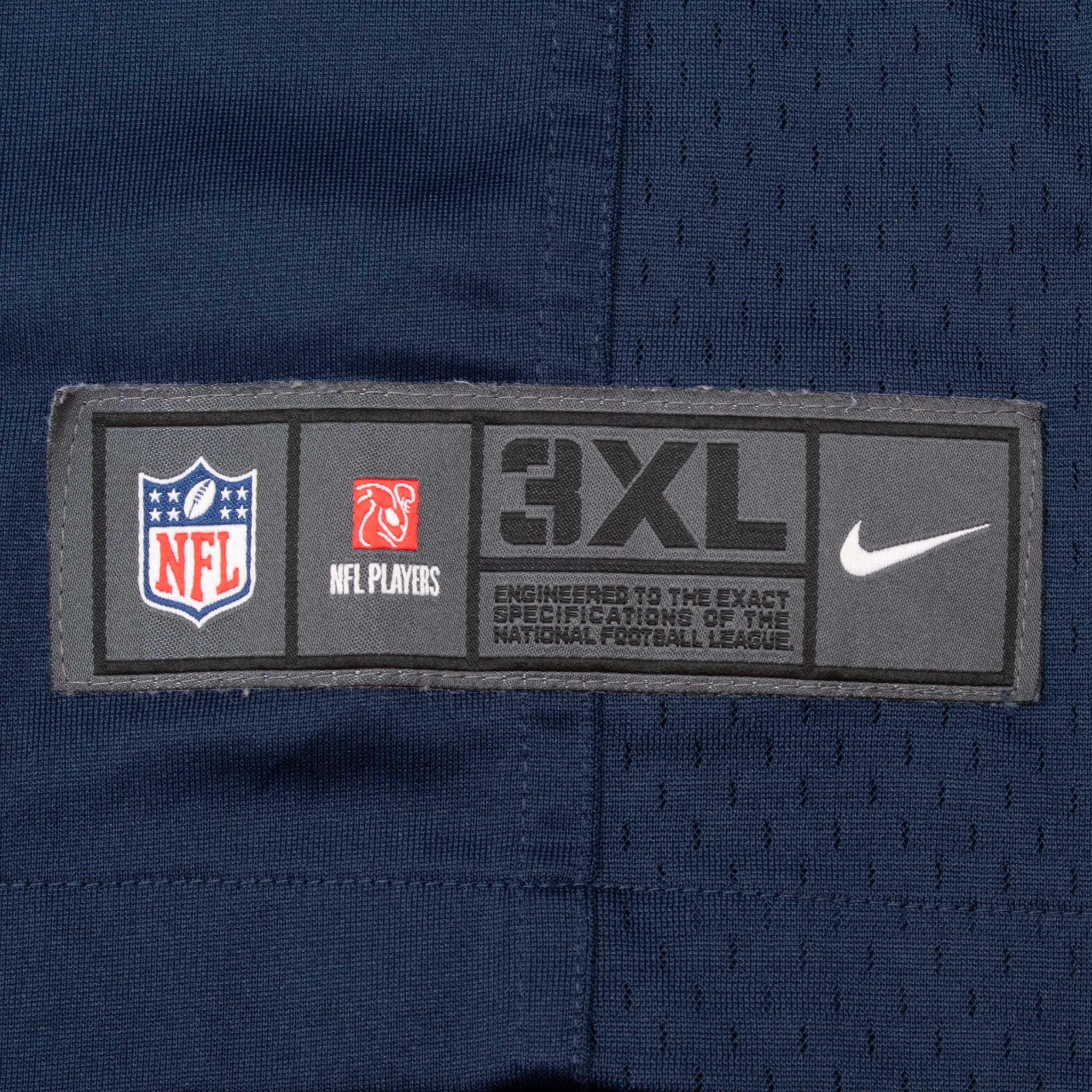 Lower front jock tag with NFL, NFL Players, Nike, and 3XL markings