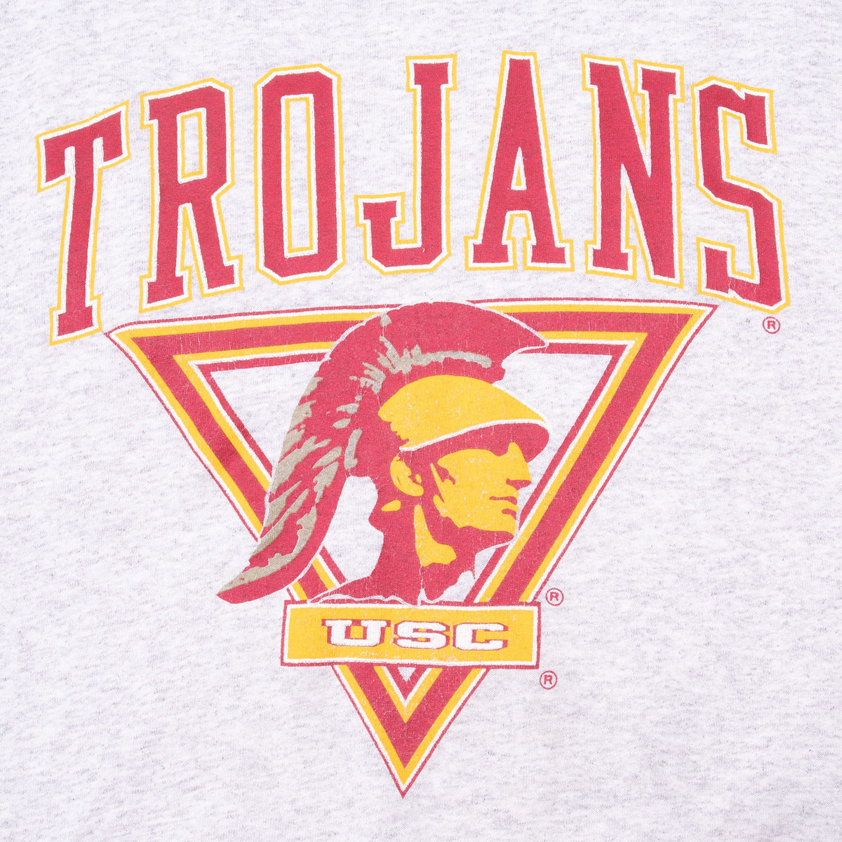 Close-up of cardinal-and-gold Trojans lettering and USC Trojan head print