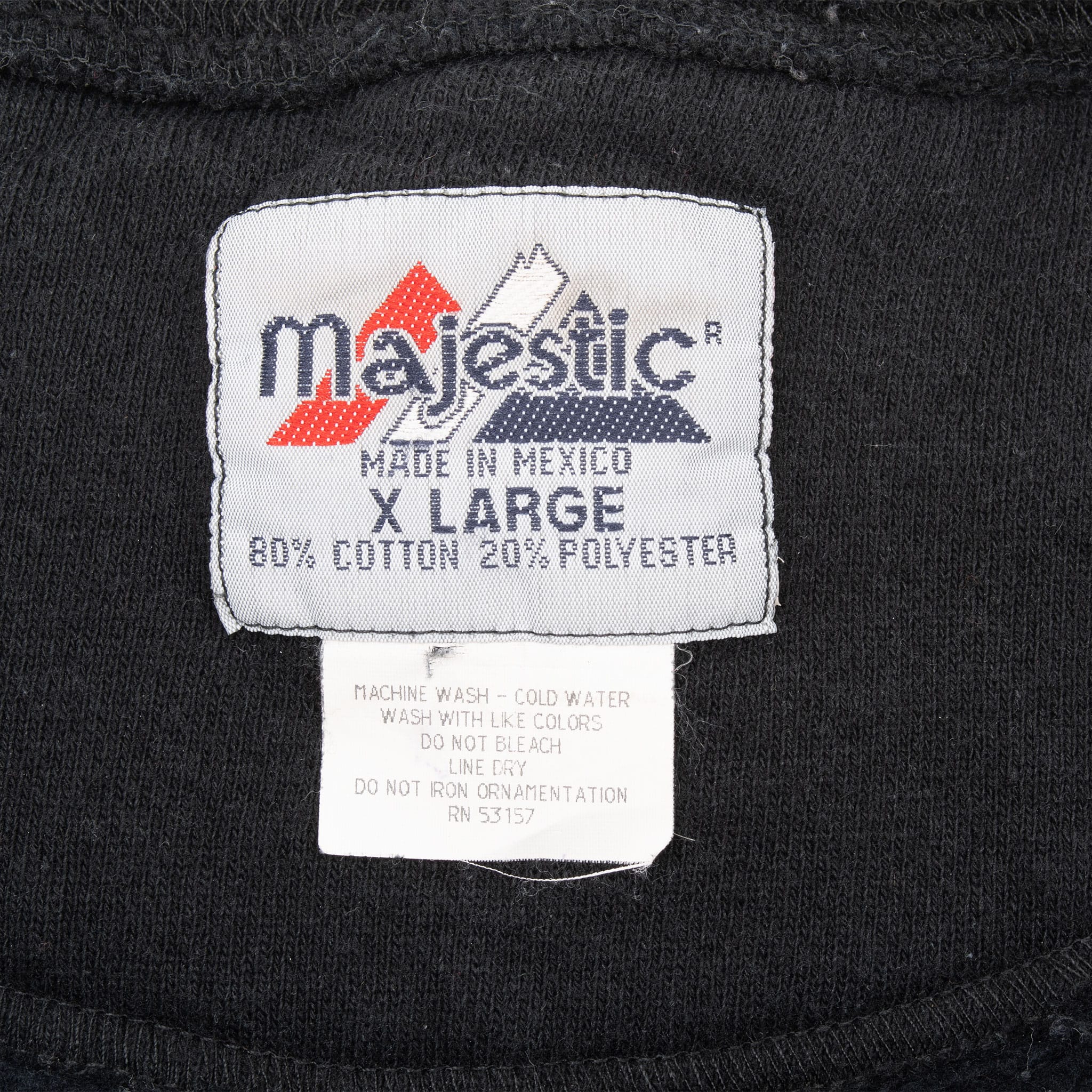 Majestic XL neck label with 80% cotton and 20% polyester fabric details