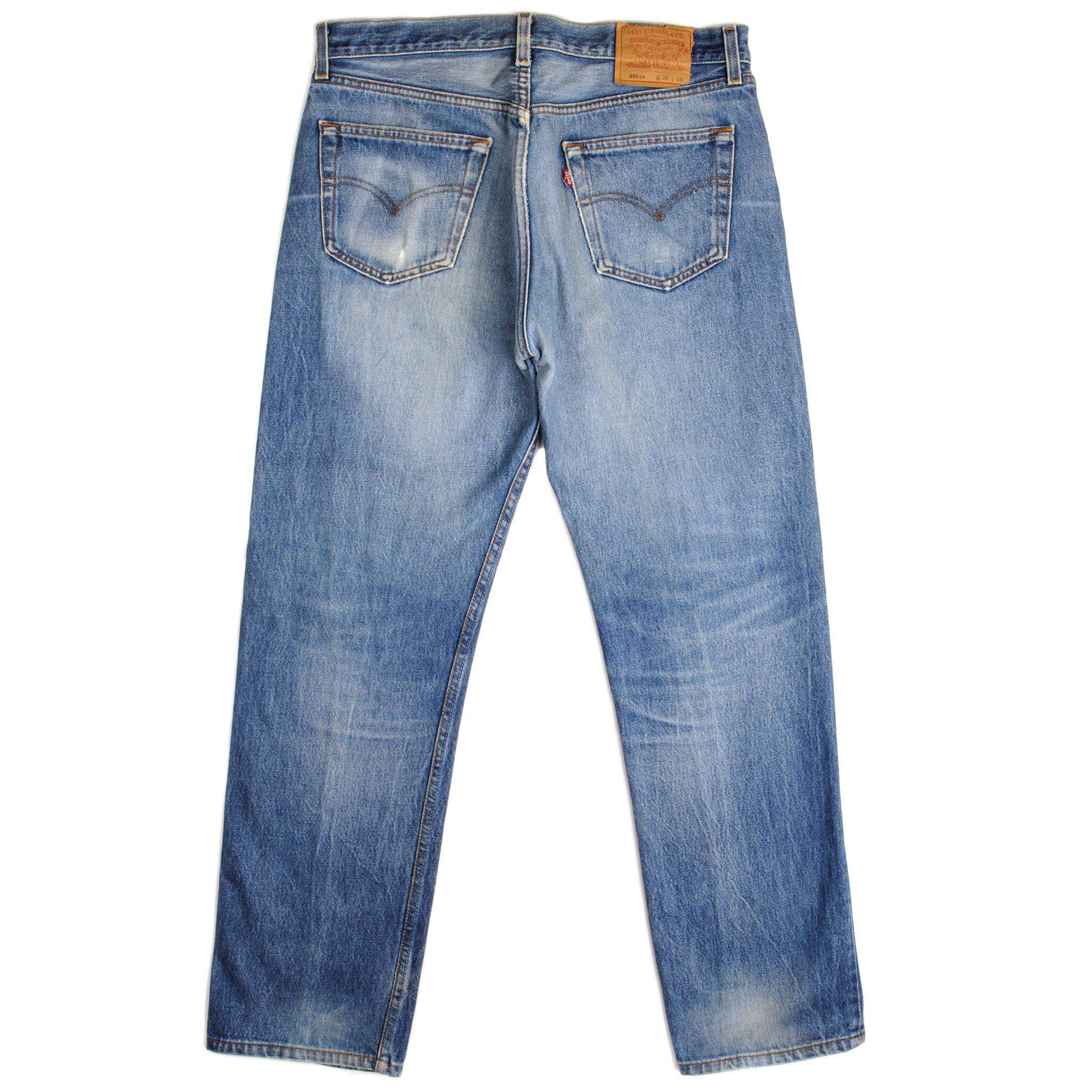 Beautiful Indigo Levis 501 Jeans Made in USA with a medium blue wash, a nice contrast of light and medium blue and some beautiful whiskers. Size 34x31 Back Button #524A