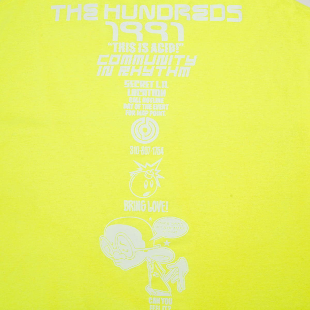 Close-up of vertical white back print with The Hundreds branding, bomb logos and character