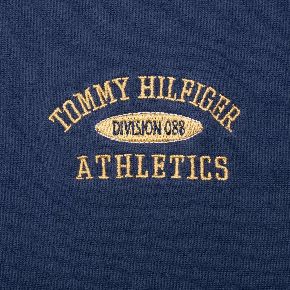 Gold Tommy Hilfiger Division 089 Athletics chest embroidery on navy fabric