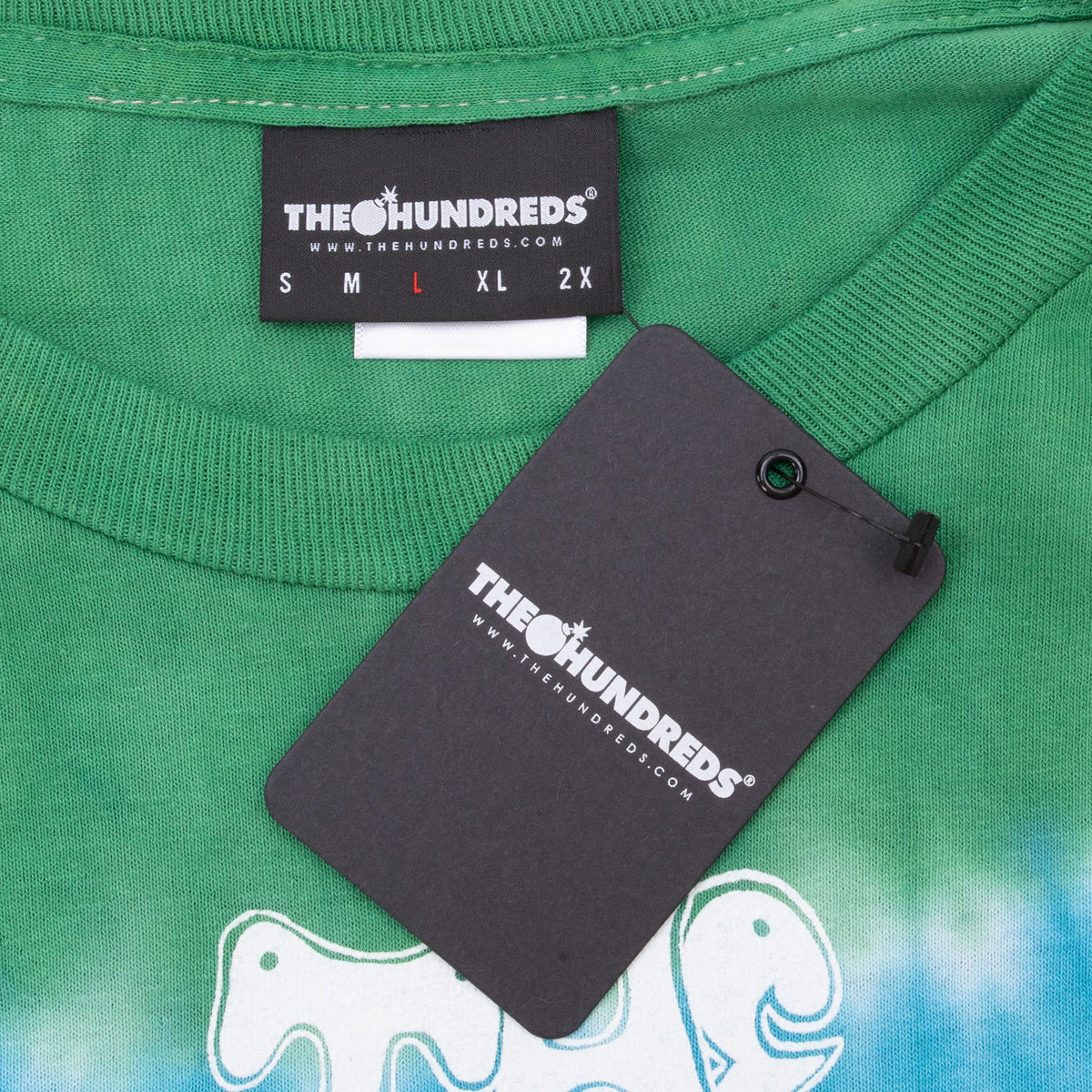 The Hundreds neck label and black hangtag on green ribbed crew neck
