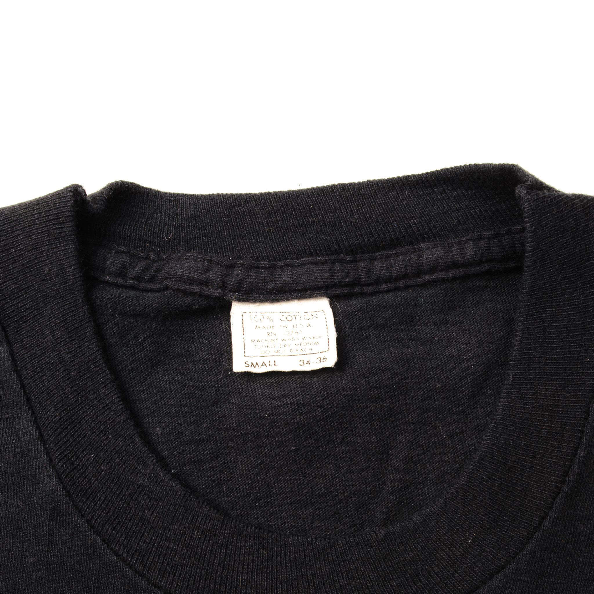 Close-up of the neck collar and garment tag on the black Ted Nugent T-shirt
