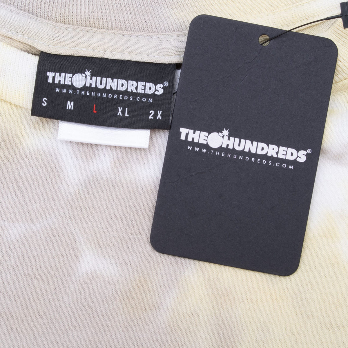 The Hundreds neck label marked L and black The Hundreds hangtag