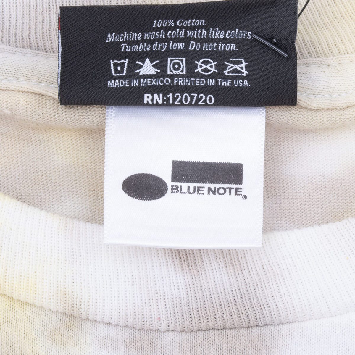 Close-up of care label and Blue Note neck label inside the shirt
