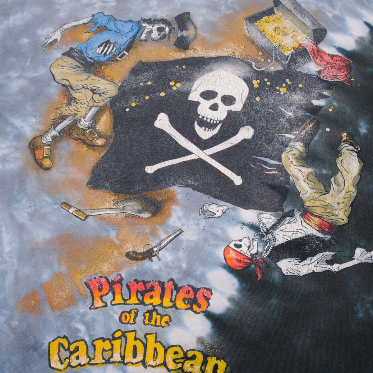Close-up of Pirates of the Caribbean back print with skull-and-crossbones flag and pirates