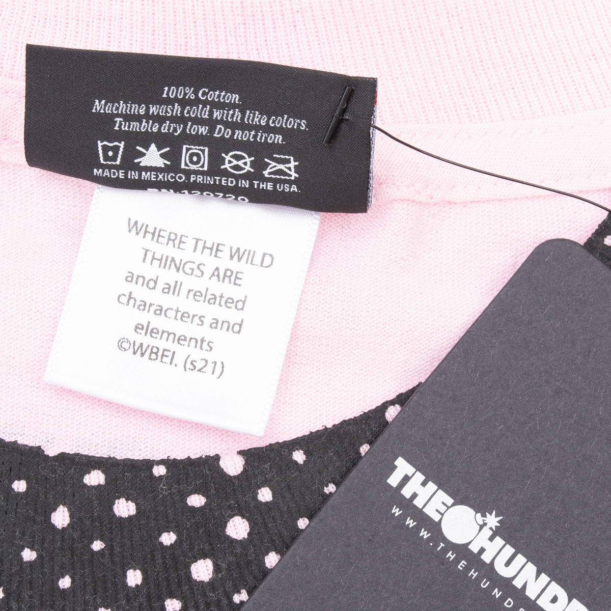 Care and Where the Wild Things Are copyright labels beside The Hundreds hangtag