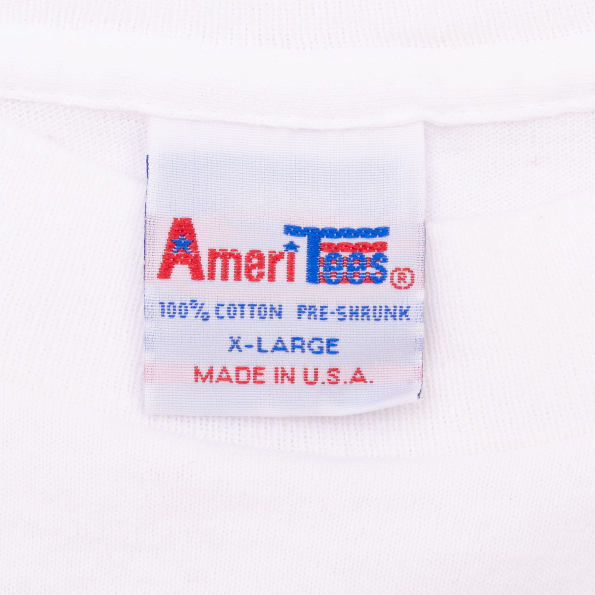 AmeriTees neck tag marked 100% cotton, X-Large, and made in U.S.A.