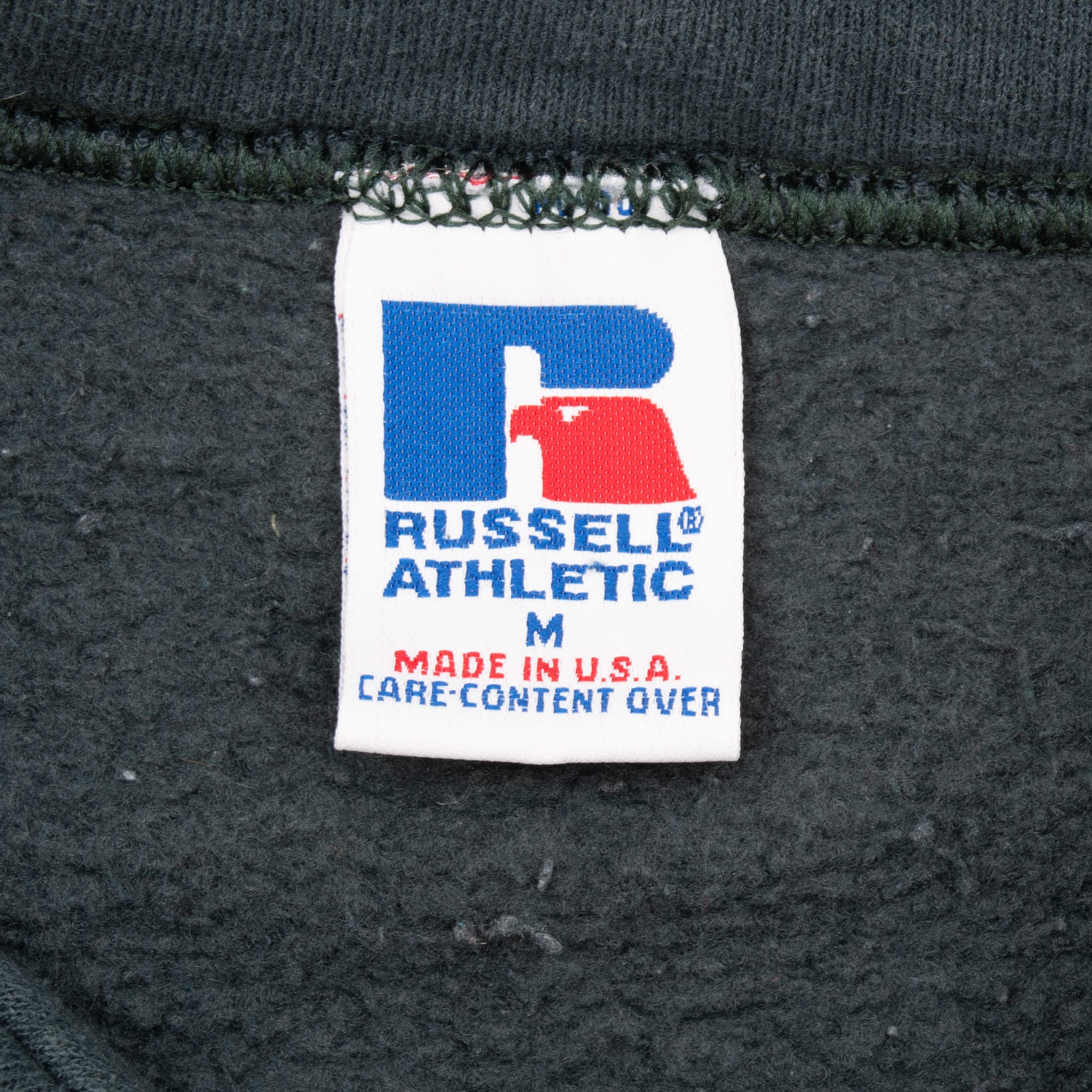 Russell Athletic neck label showing size medium and Made in USA