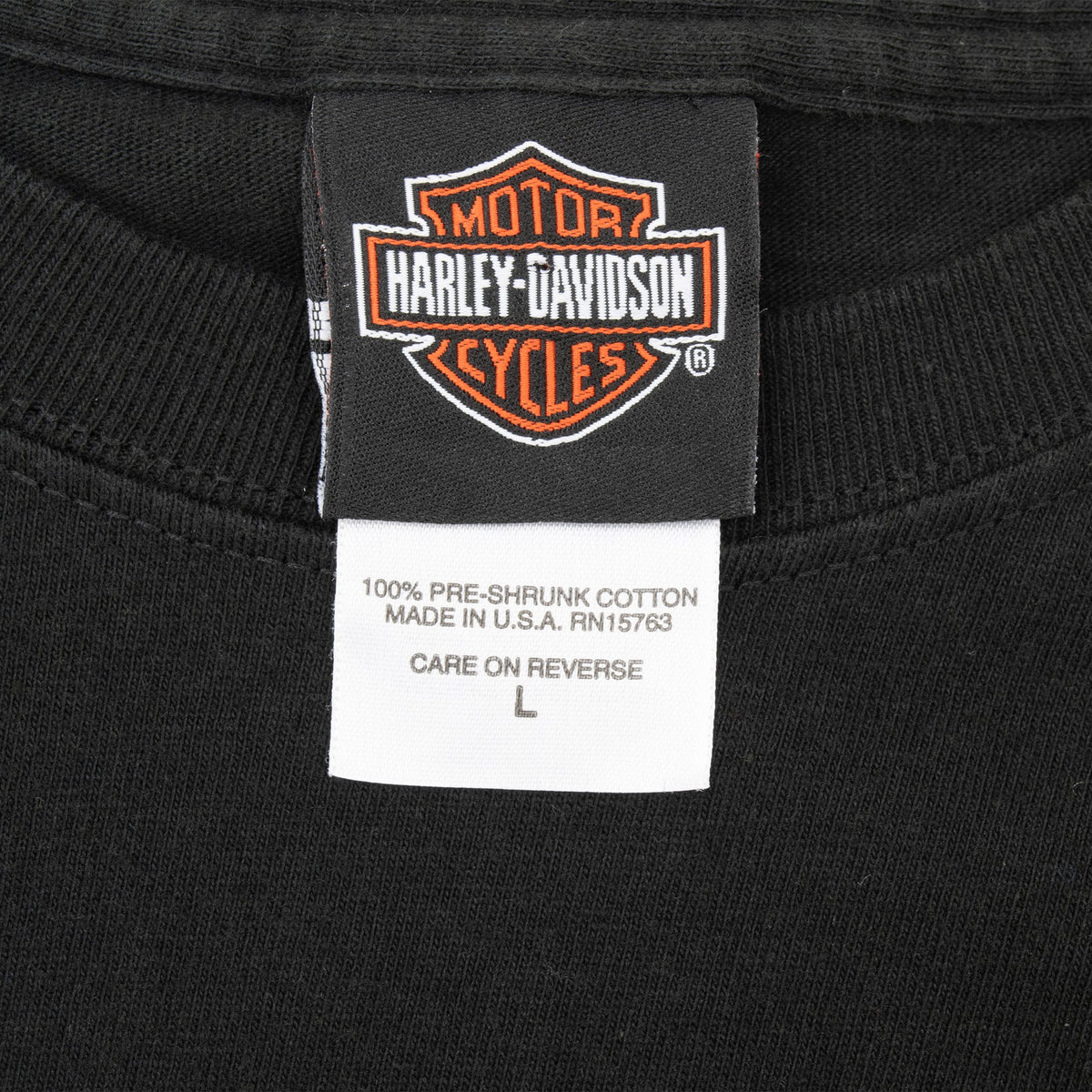 Harley-Davidson neck tag and size large care label on black T-shirt