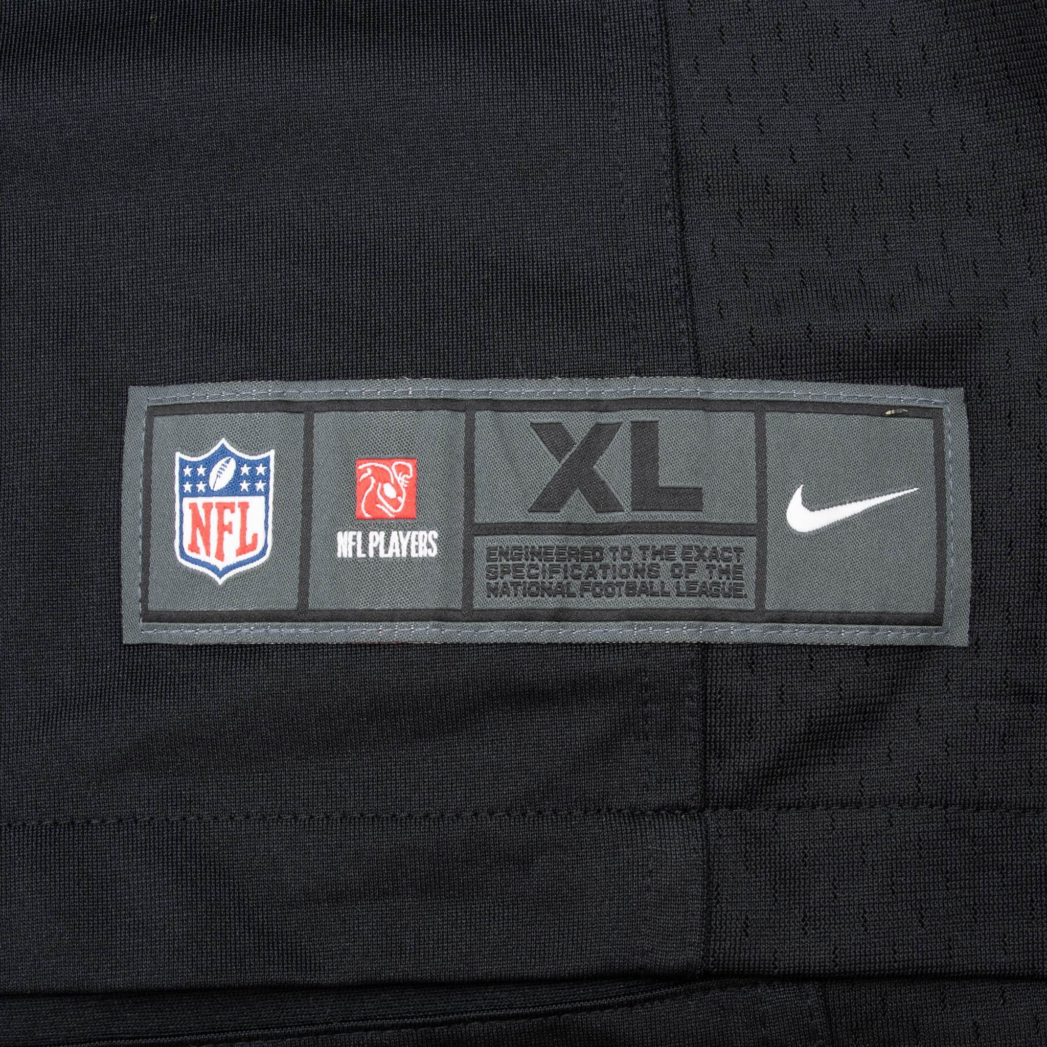 Nike NFL XL jock tag stitched near the jersey hem