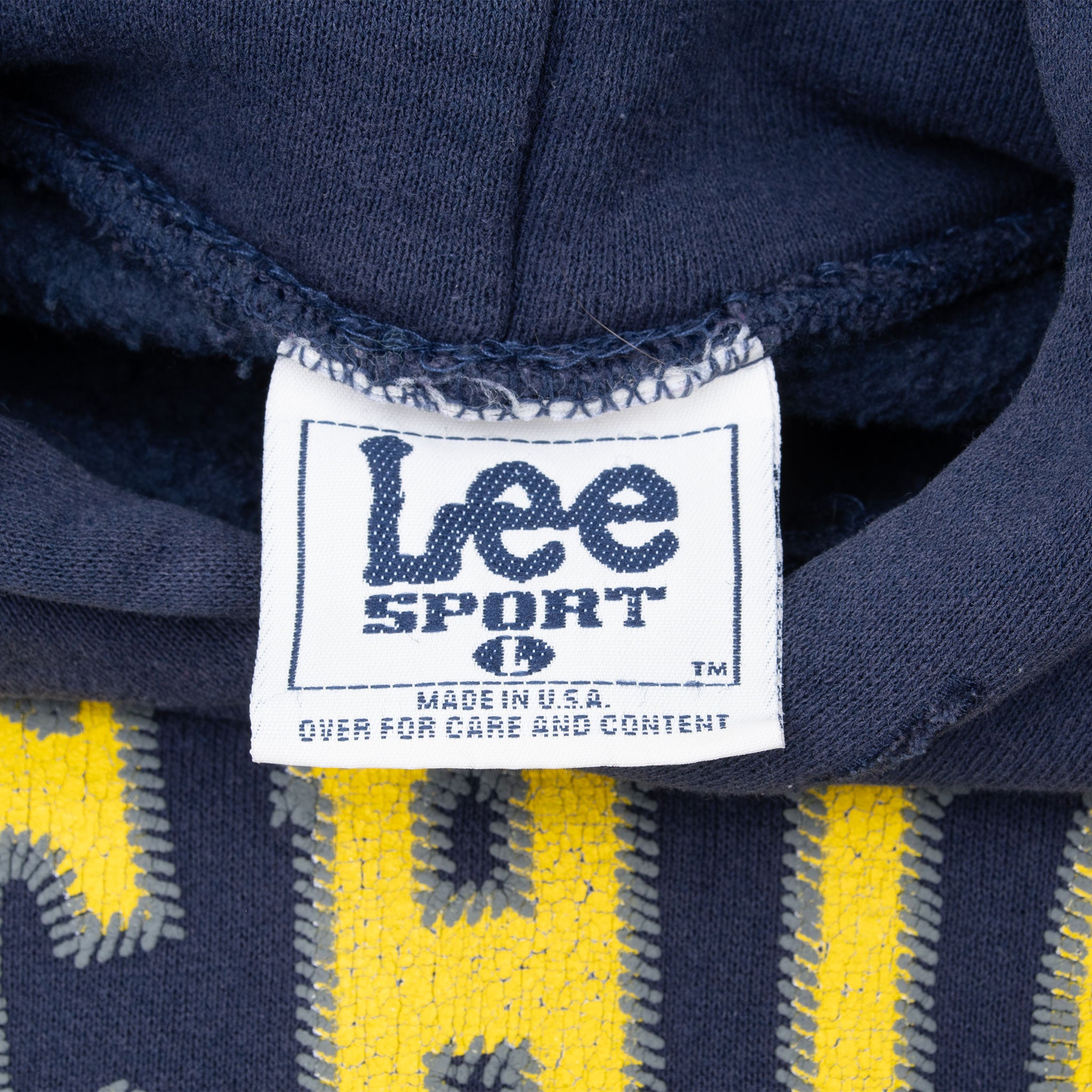 Close-up of Lee Sport neck label on Michigan Wolverines hoodie