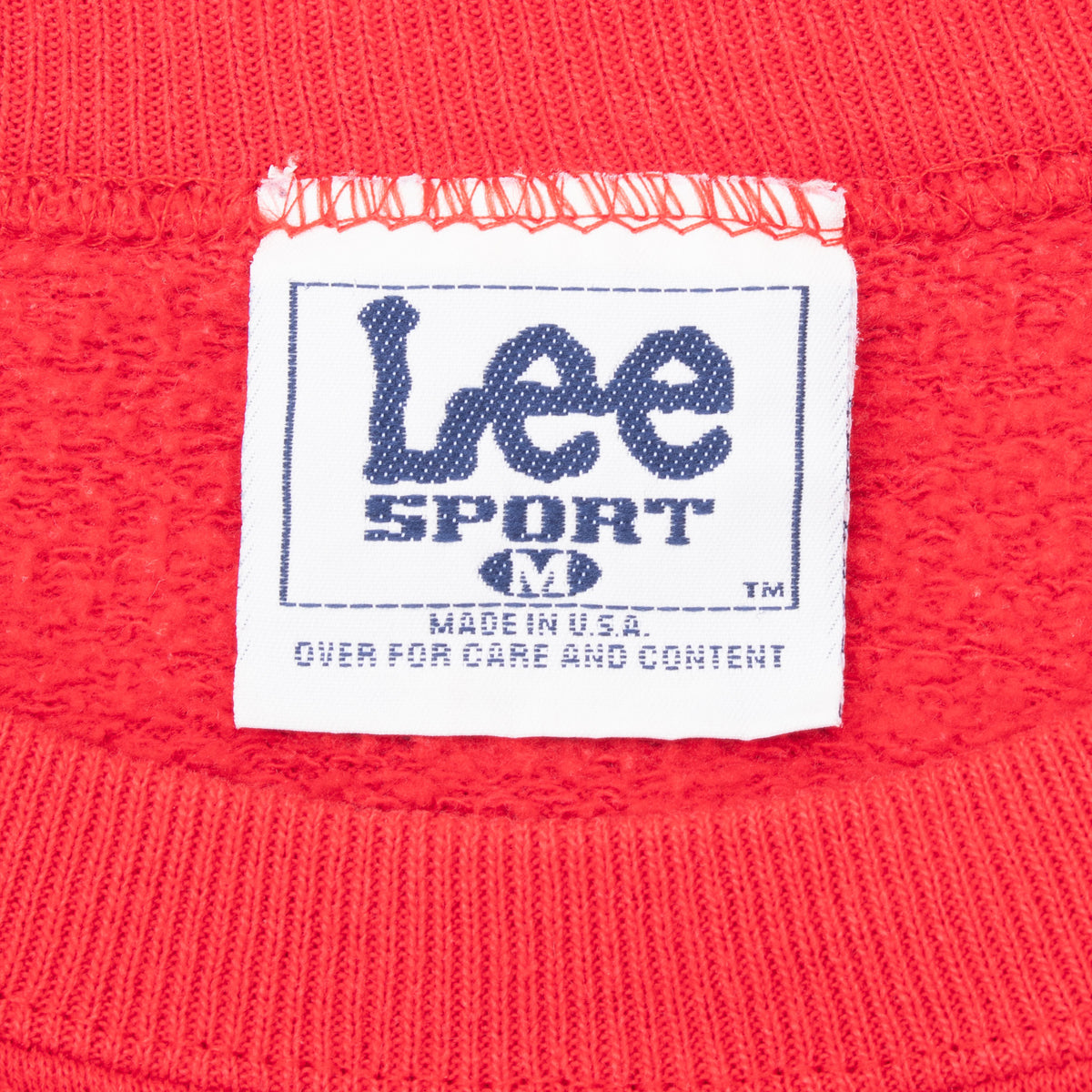 Lee Sport medium neck label inside red sweatshirt