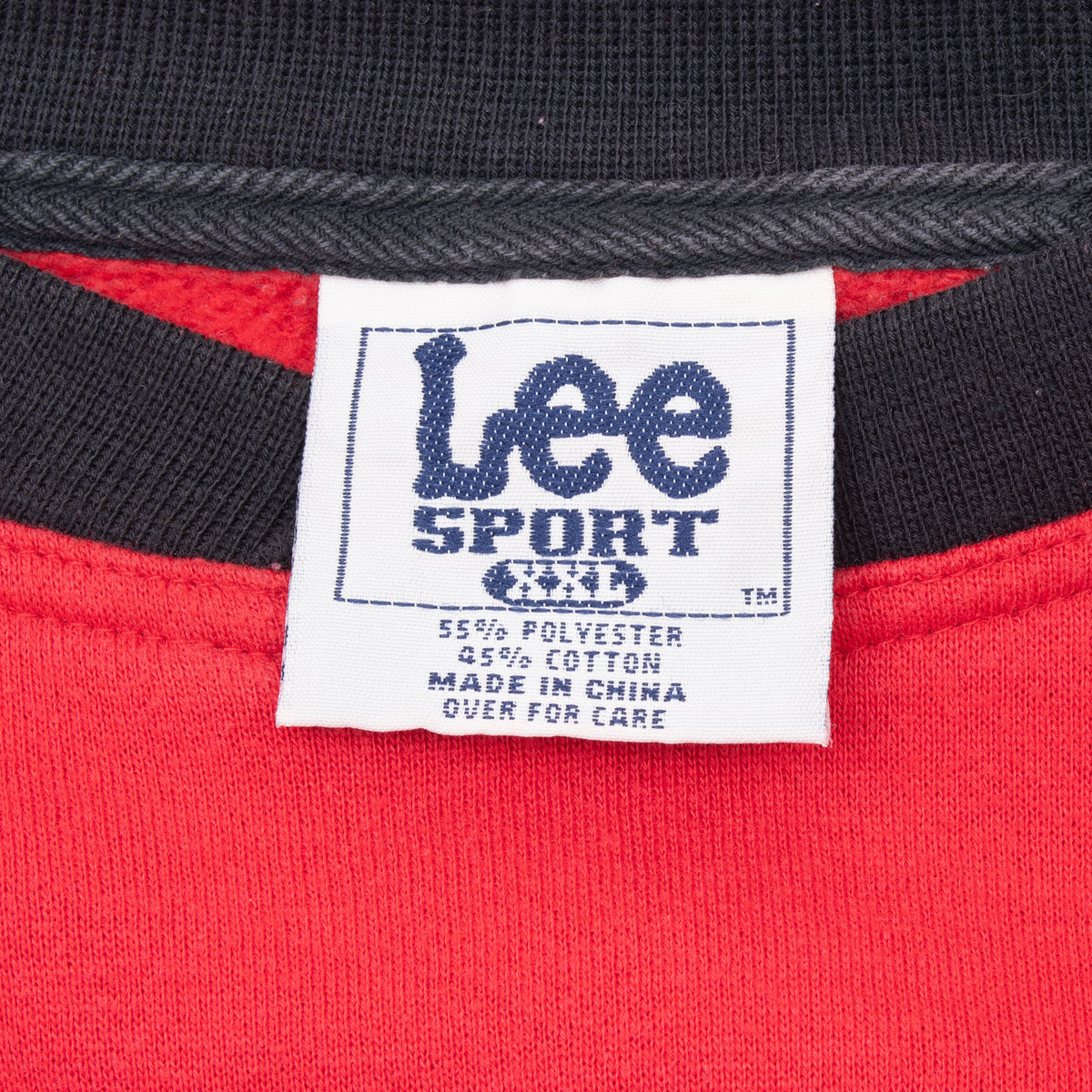 Close-up of Lee Sport neck label on Wisconsin Badgers sweatshirt