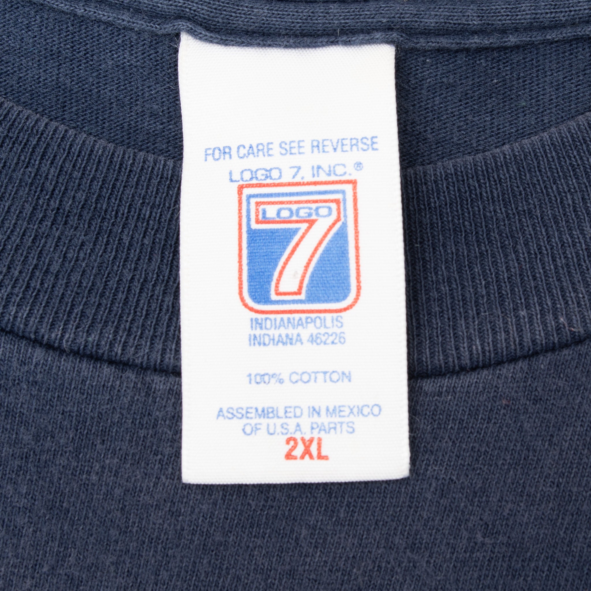 Logo 7 neck tag showing 2XL and 100% cotton