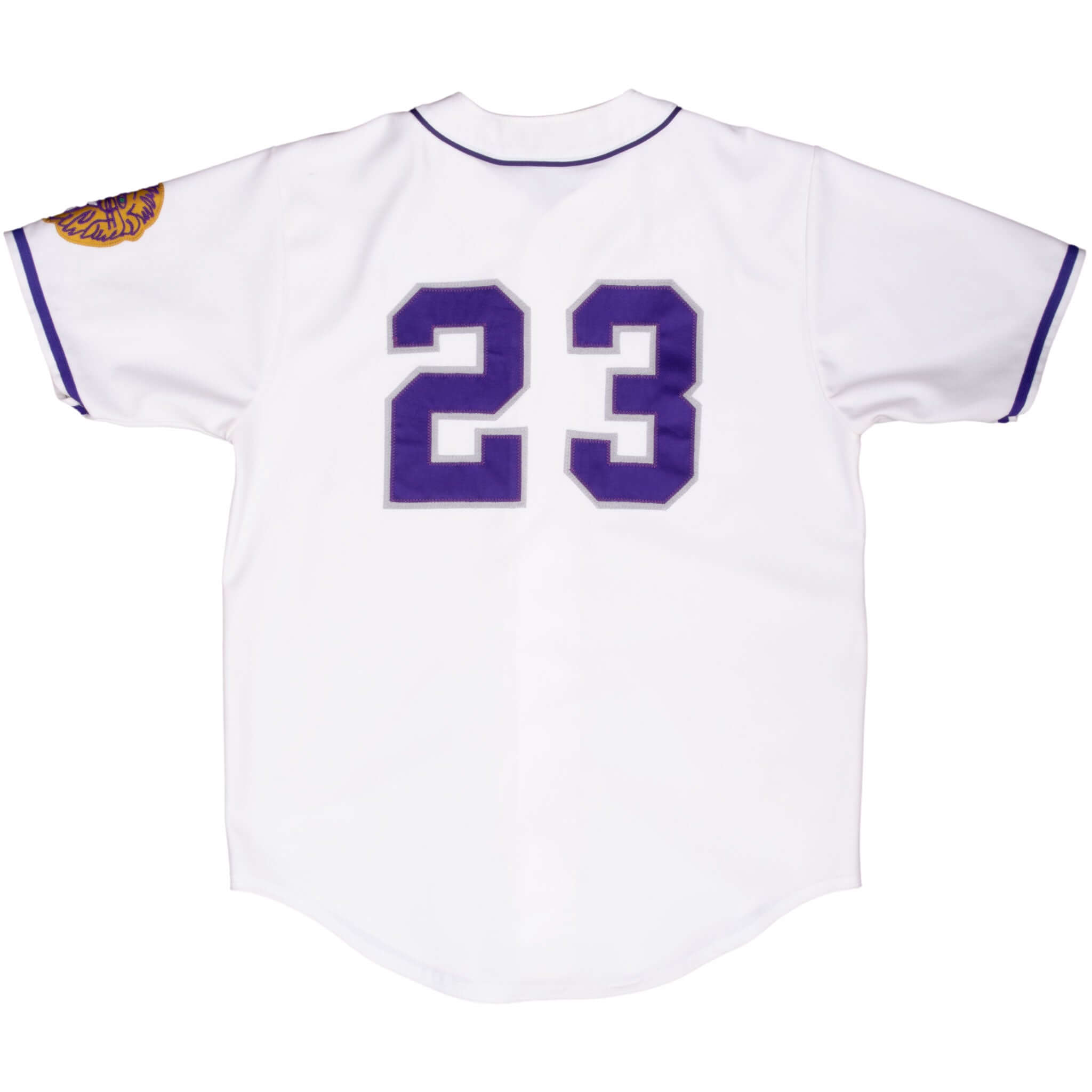 Back of white West baseball jersey with large purple number 23 and purple sleeve trim