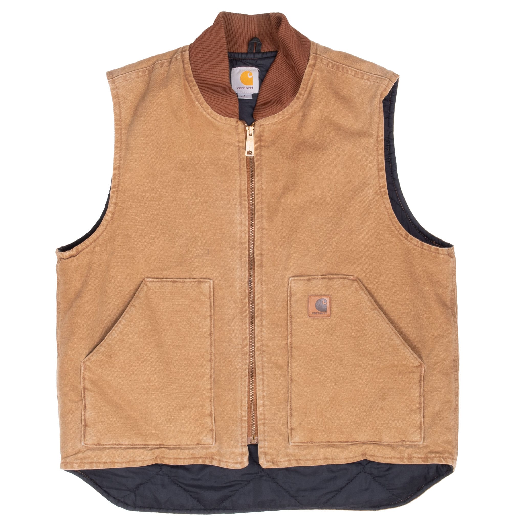 Front of brown Carhartt vest showing dark quilted lining below the hem