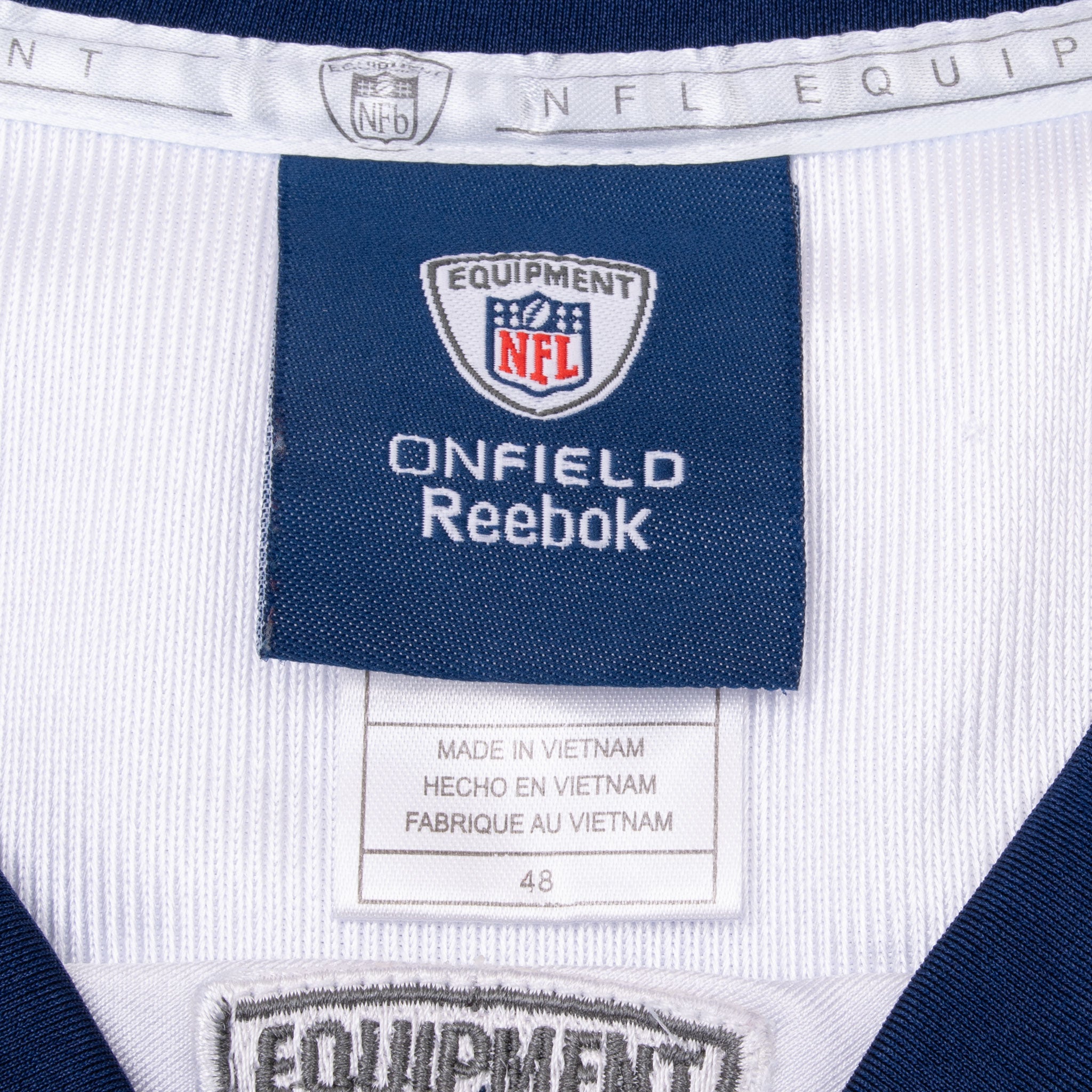 Reebok NFL Equipment neck label and size 48 tag inside Broncos jersey