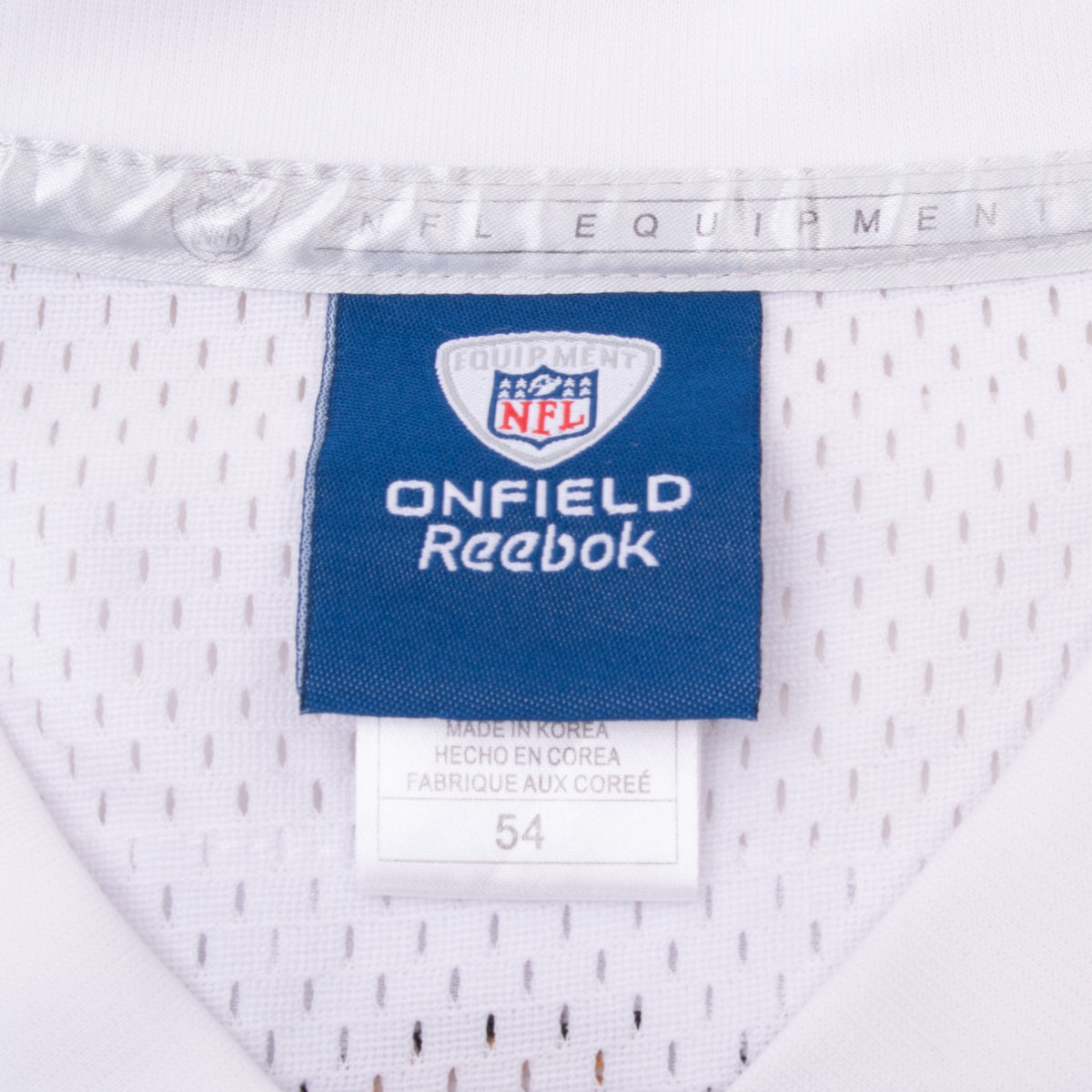 Reebok NFL Equipment neck label and size 54 tag inside white jersey