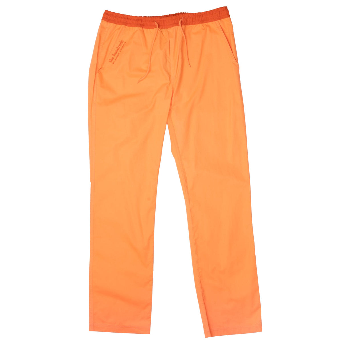 Front of orange The Hundreds by Anwar Carrots jogger pants with drawstring waist