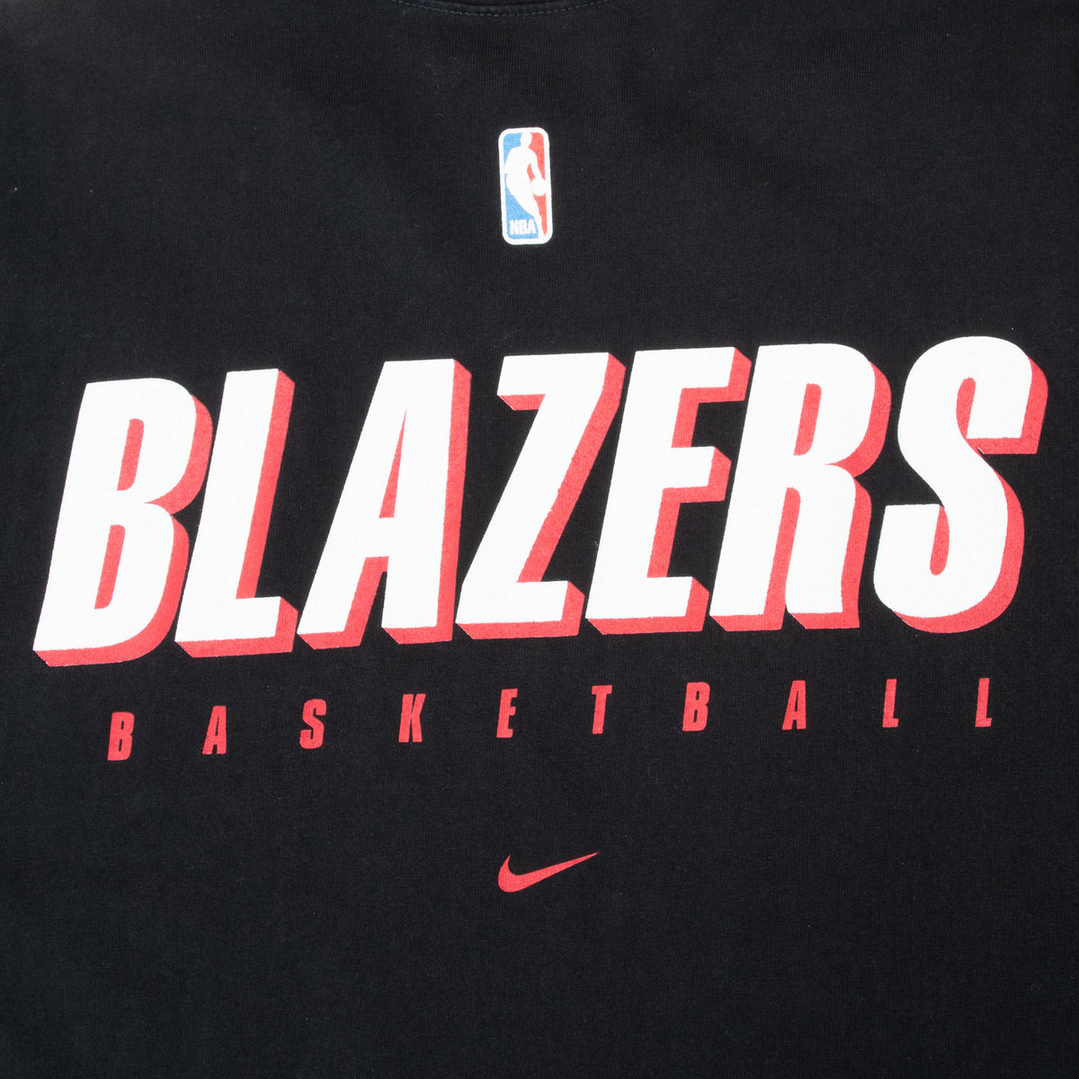 Close-up of back Blazers Basketball print with NBA logo and red Nike Swoosh