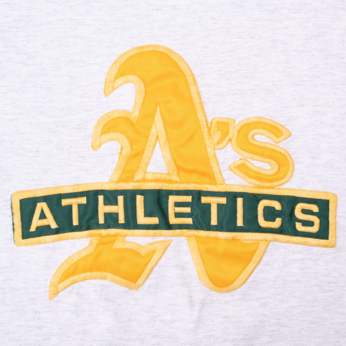 Close-up of yellow and green embroidered Oakland Athletics A's chest logo