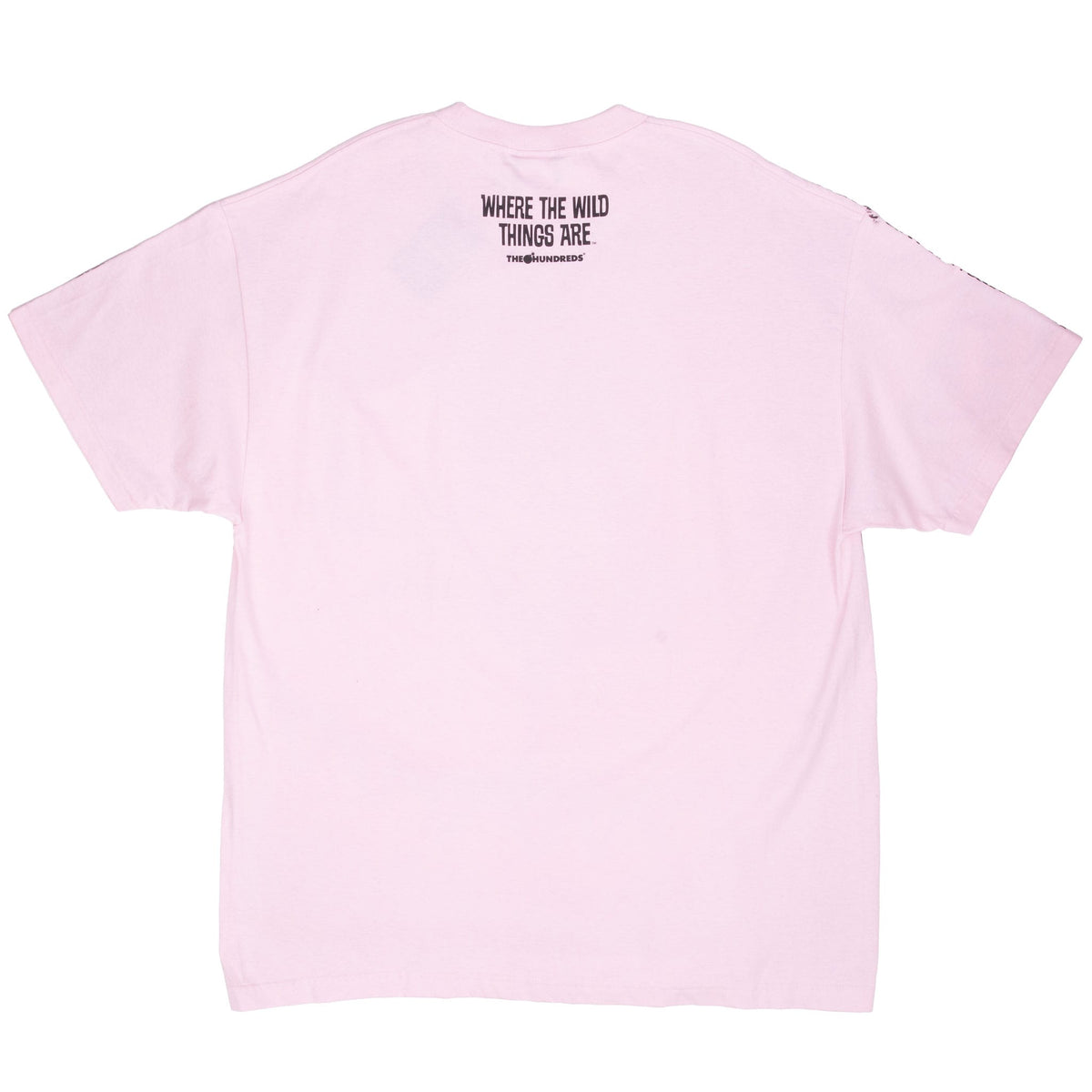 Back of pink T-shirt with Where the Wild Things Are and The Hundreds logos below collar