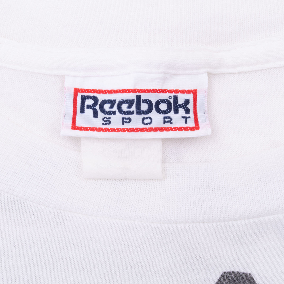 Reebok Sport woven neck label on white T-shirt
