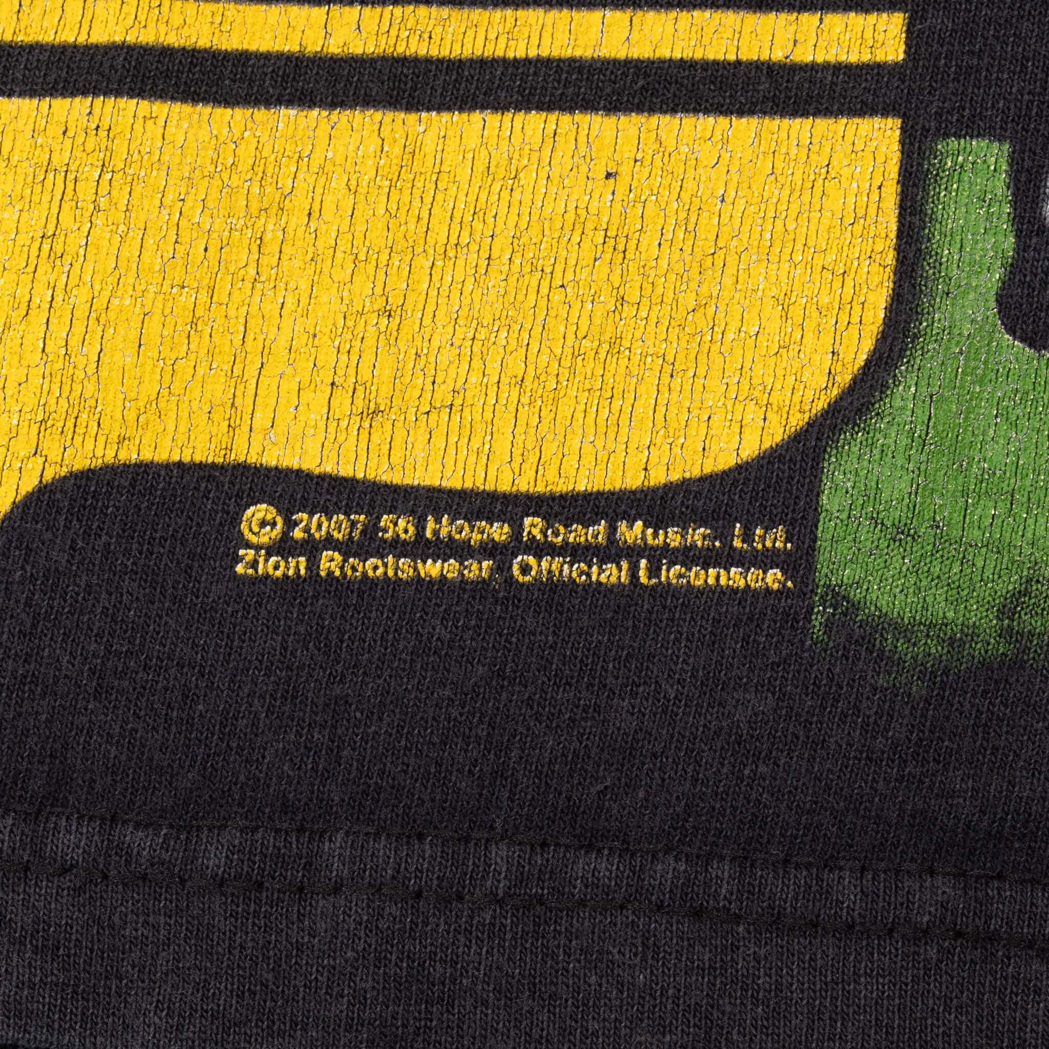 Close-up of 2007 Fifty-Six Hope Road Music and Zion Rootswear copyright print