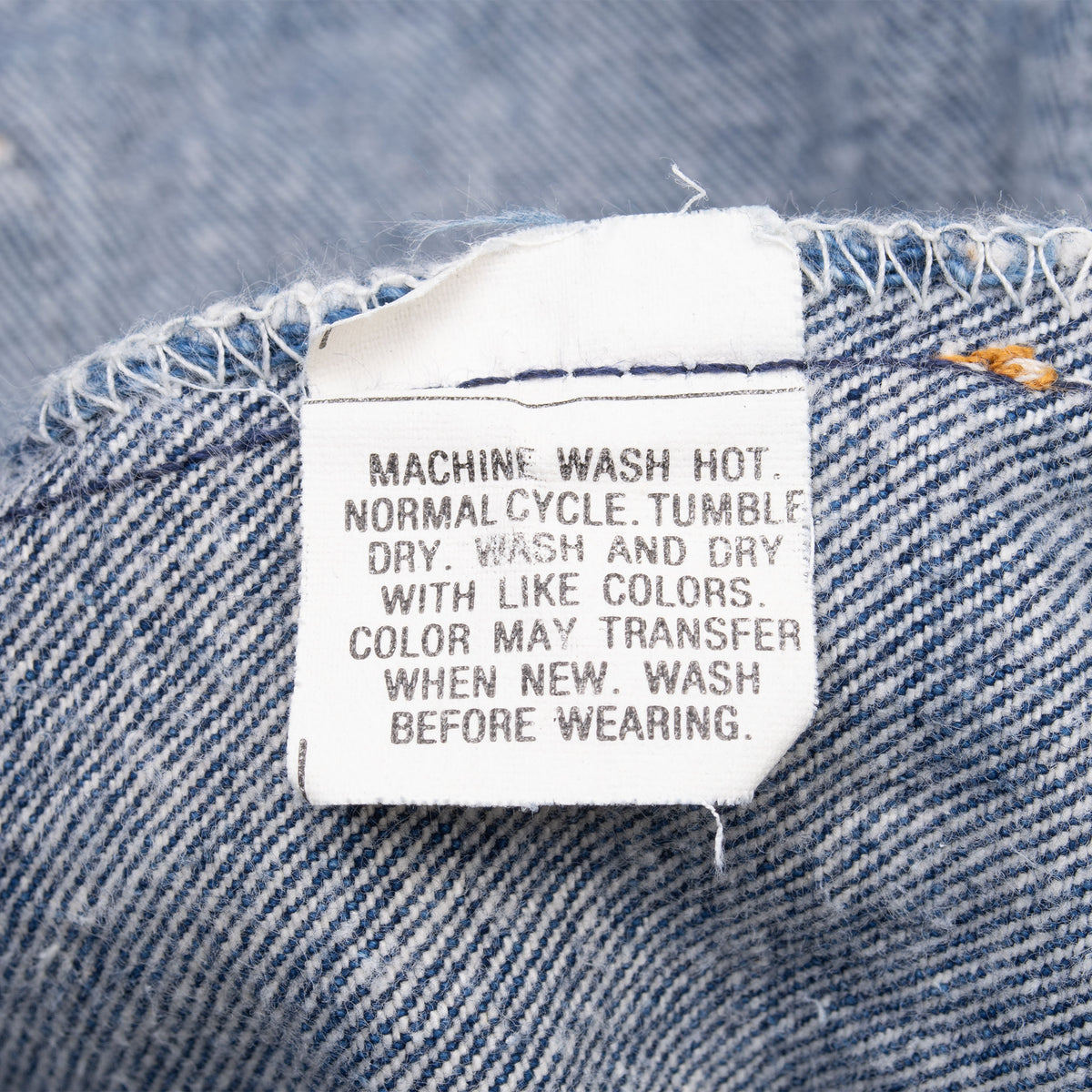 Close-up of care instruction label inside Levi's 501 jeans
