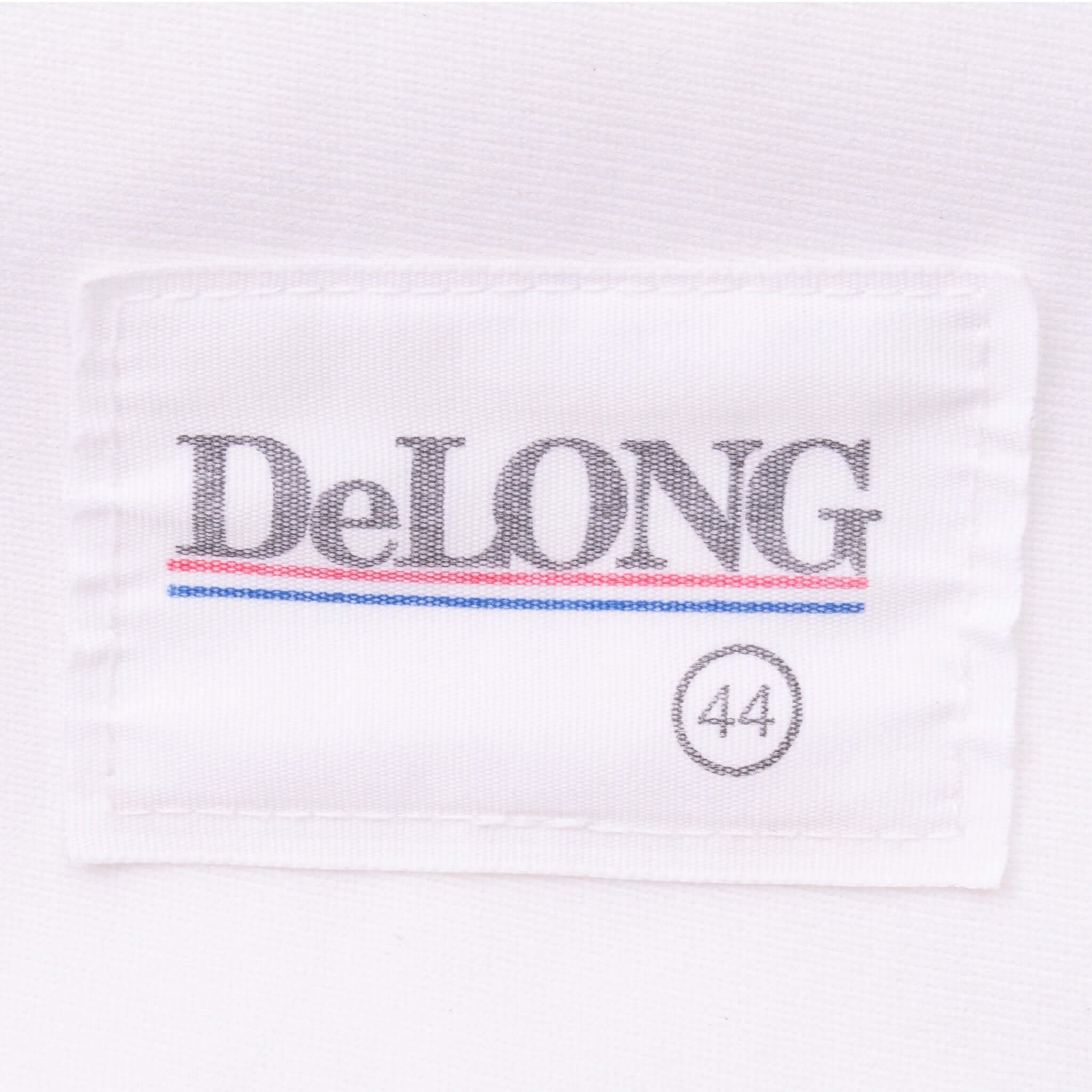 Close-up of DeLong jersey label marked size 44