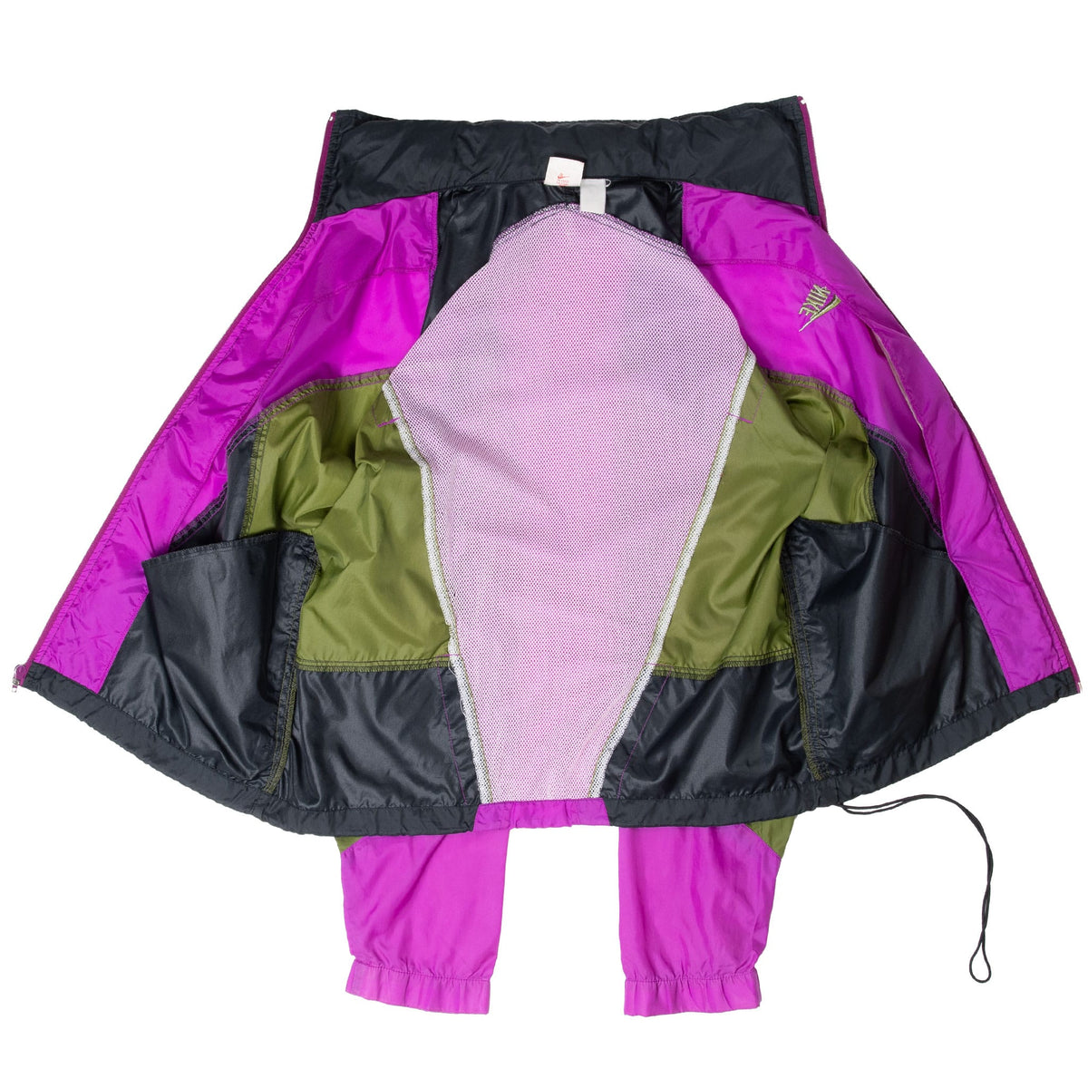 Open Nike windbreaker showing purple mesh lining, interior panels and pockets