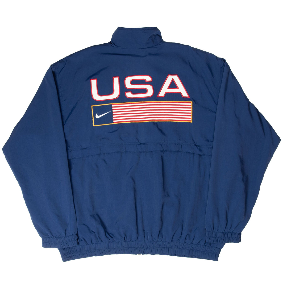 Full back view of navy Nike windbreaker with USA lettering and red-and-white striped flag graphic