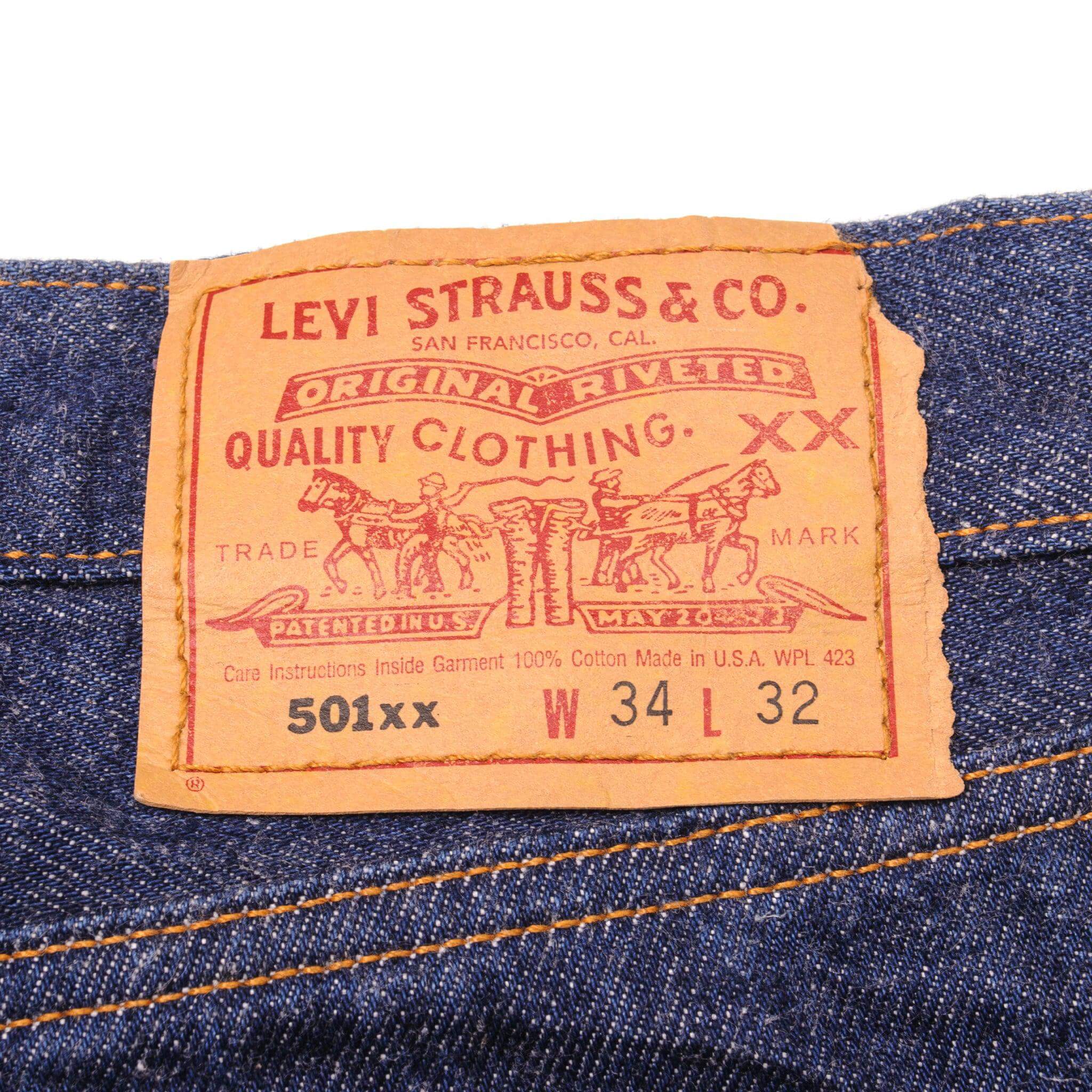 Beautiful Indigo Levis 501 Jeans Made in USA with a very dark wash. Size on Tag 34X32 ACTUAL SIZE 34X30 Back Button #524