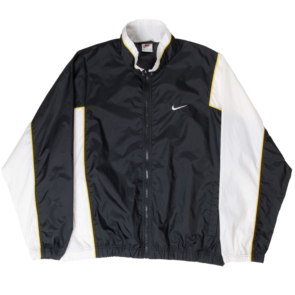 Front of black Nike windbreaker jacket with white color-block panels and yellow piping