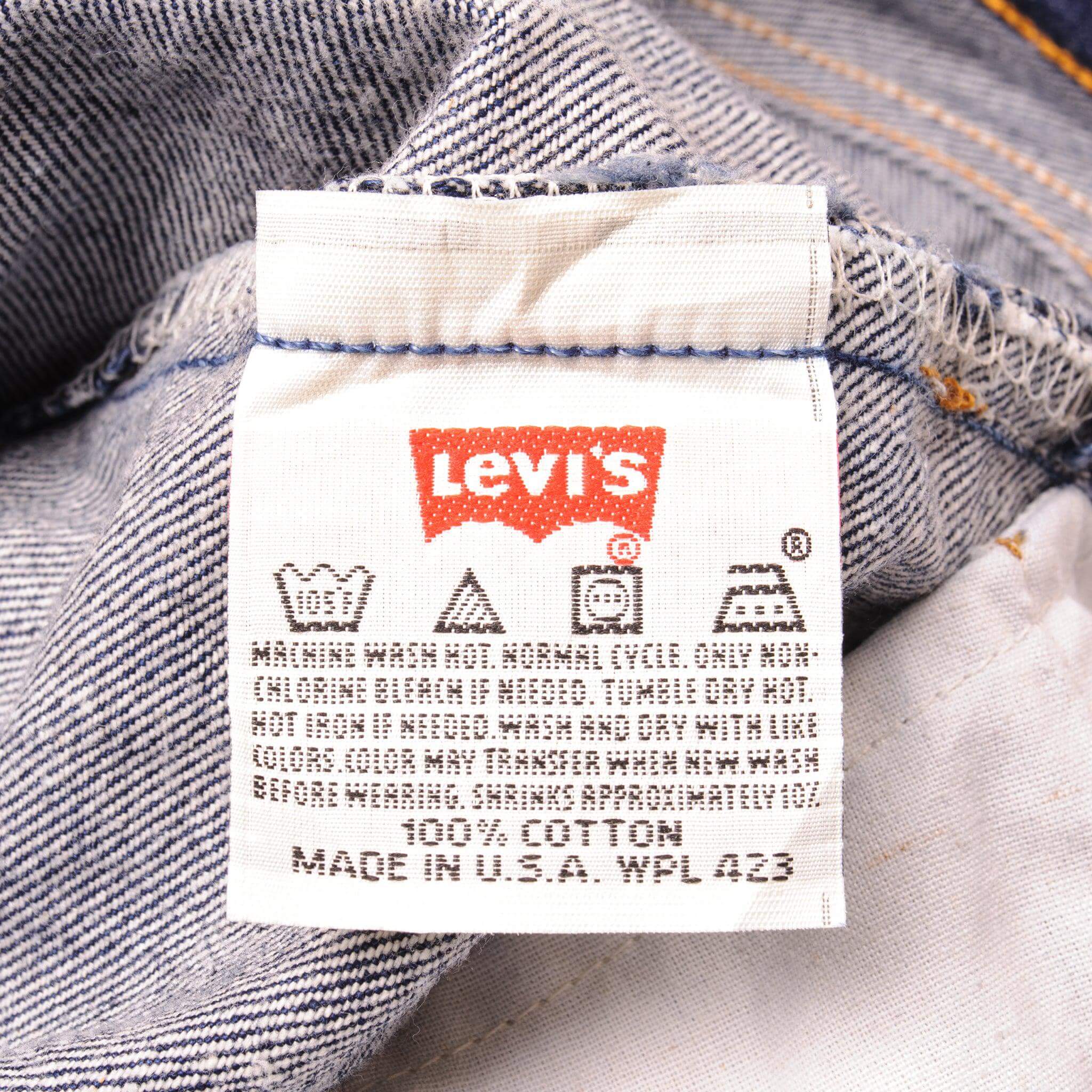 Beautiful Indigo Levis 501 Jeans Made in USA with a very dark wash. Size on Tag 34X32 ACTUAL SIZE 34X30 Back Button #524