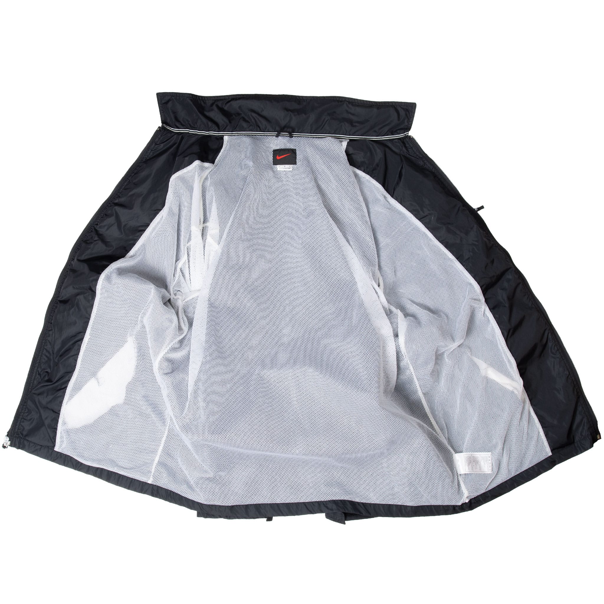 Open black Nike windbreaker showing white mesh interior lining