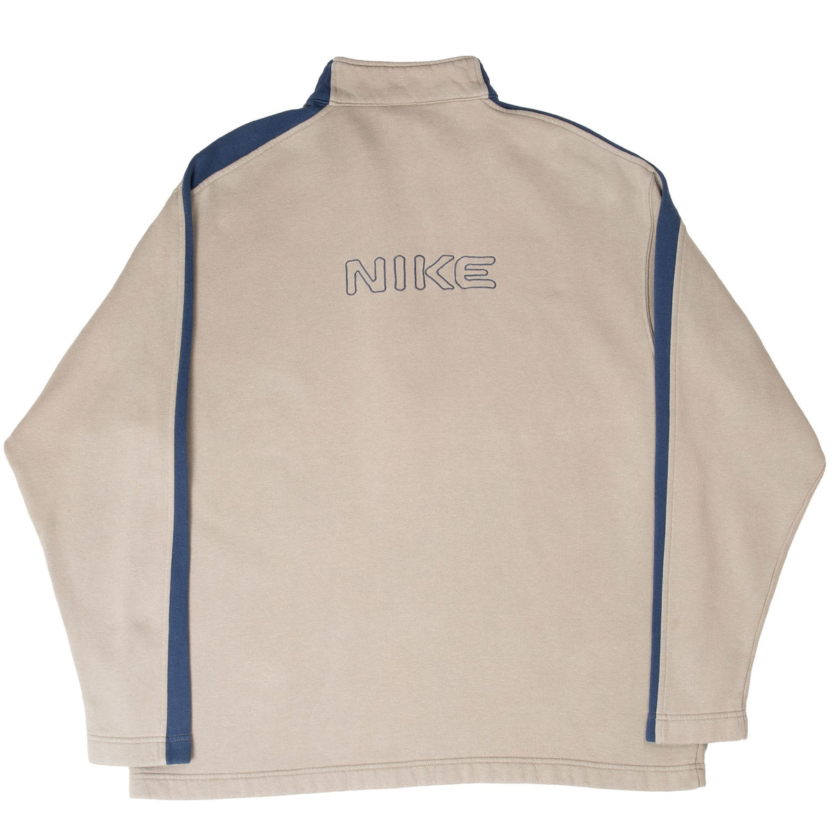 Back of beige Nike quarter-zip sweatshirt with outlined lettering and navy stripes