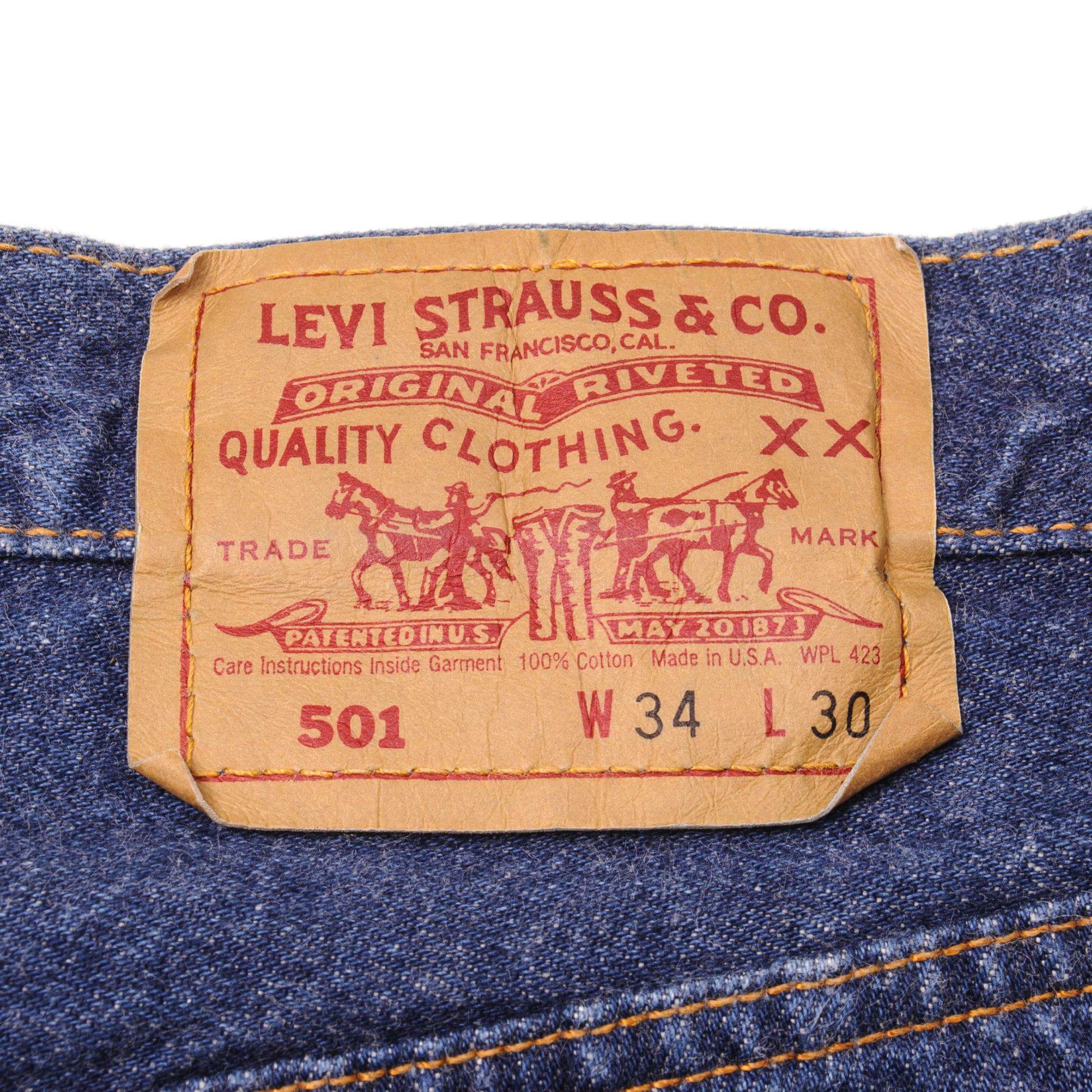 Beautiful Indigo Levis 501 Jeans Made in USA with a very dark wash. Size on Tag 34X30 ACTUAL SIZE 33X30 Back Button #501