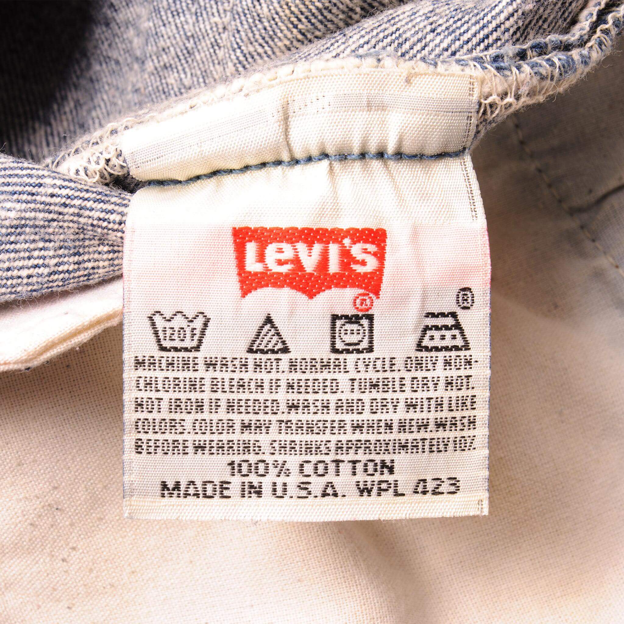 Beautiful Indigo Levis 501 Jeans 1990's Made in USA with a dark blue wash, some nice contrast between light and dark blue. Size on Tag 42X33 ACTUAL SIZE 41X29 Back Button #552