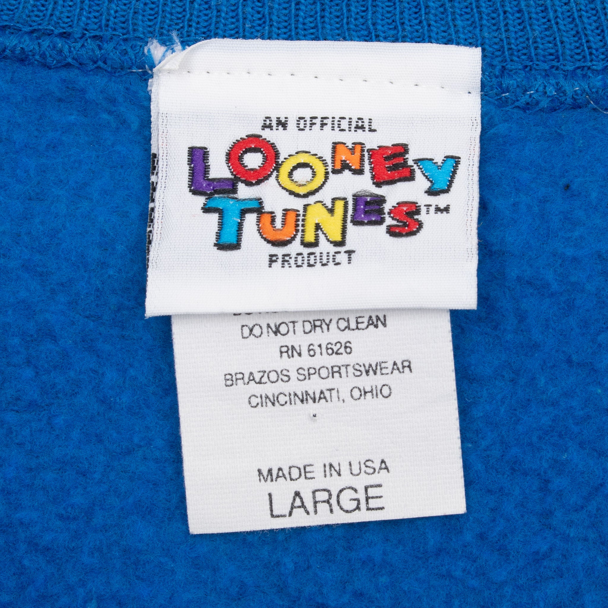 Looney Tunes neck and care labels marked large and made in USA