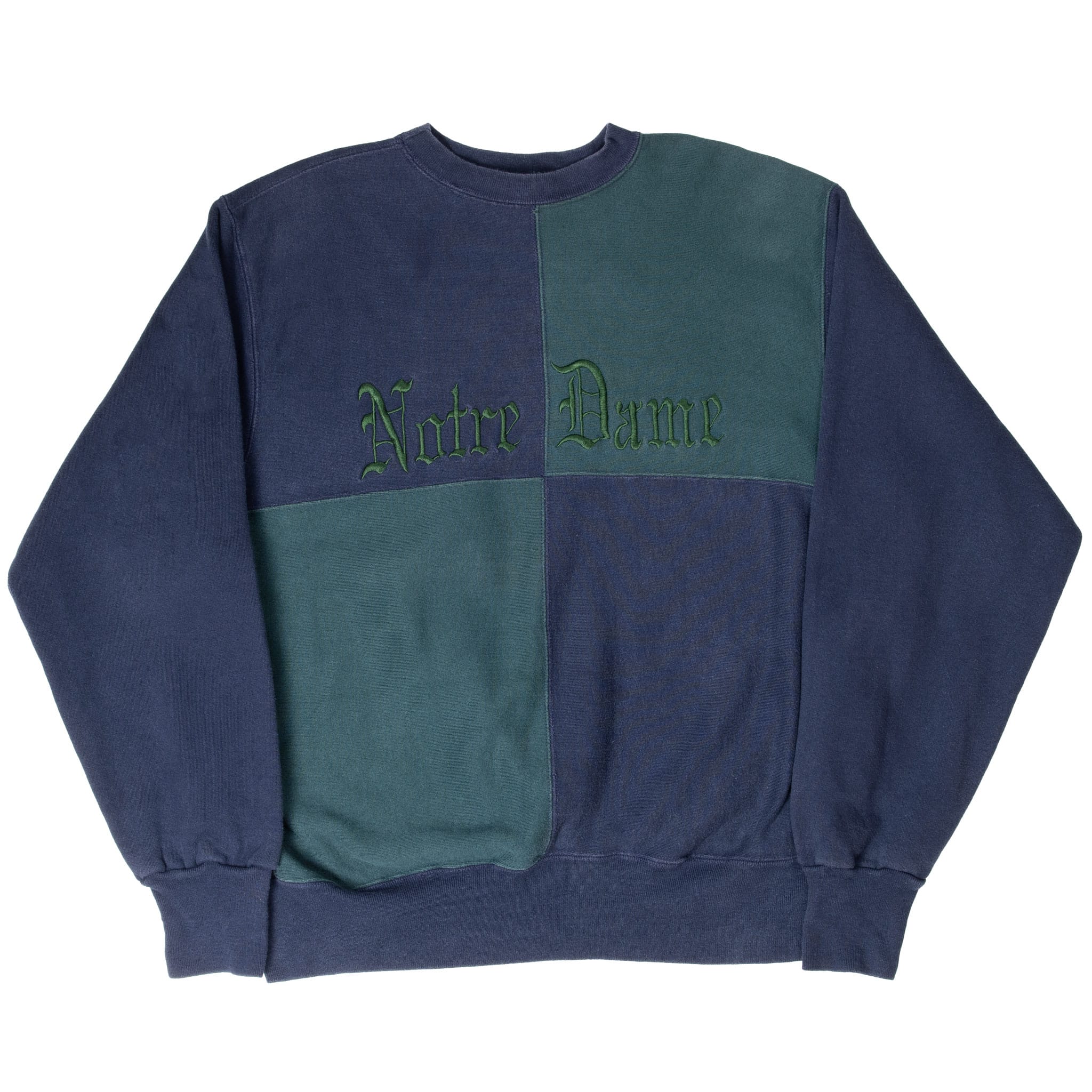 Full front view of navy and green quartered Notre Dame crewneck sweatshirt