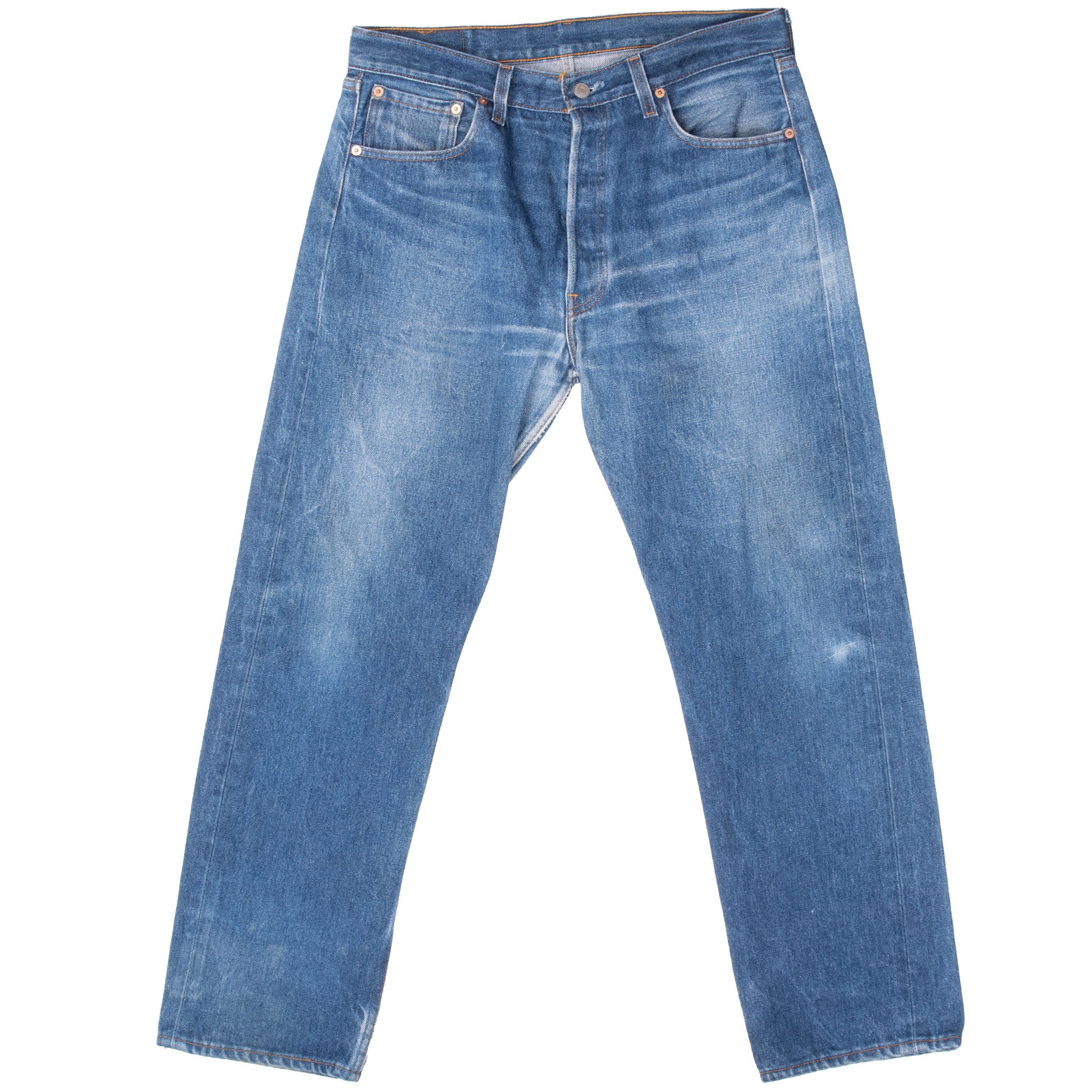 Vintage Preshrunk Levis 501 Indigo Jeans 1990S Size 34X30 Made In Usa With a beatiful Medium Light Wash and some light whiskers
Size on Tag 35X32 Actual size 34X30
Back Button #524