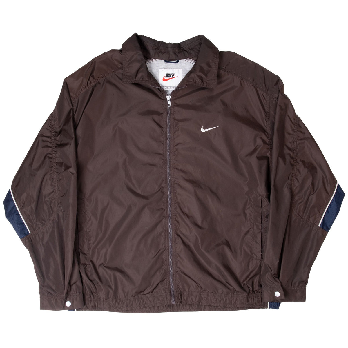Front of brown Nike windbreaker with white Swoosh and navy sleeve panels